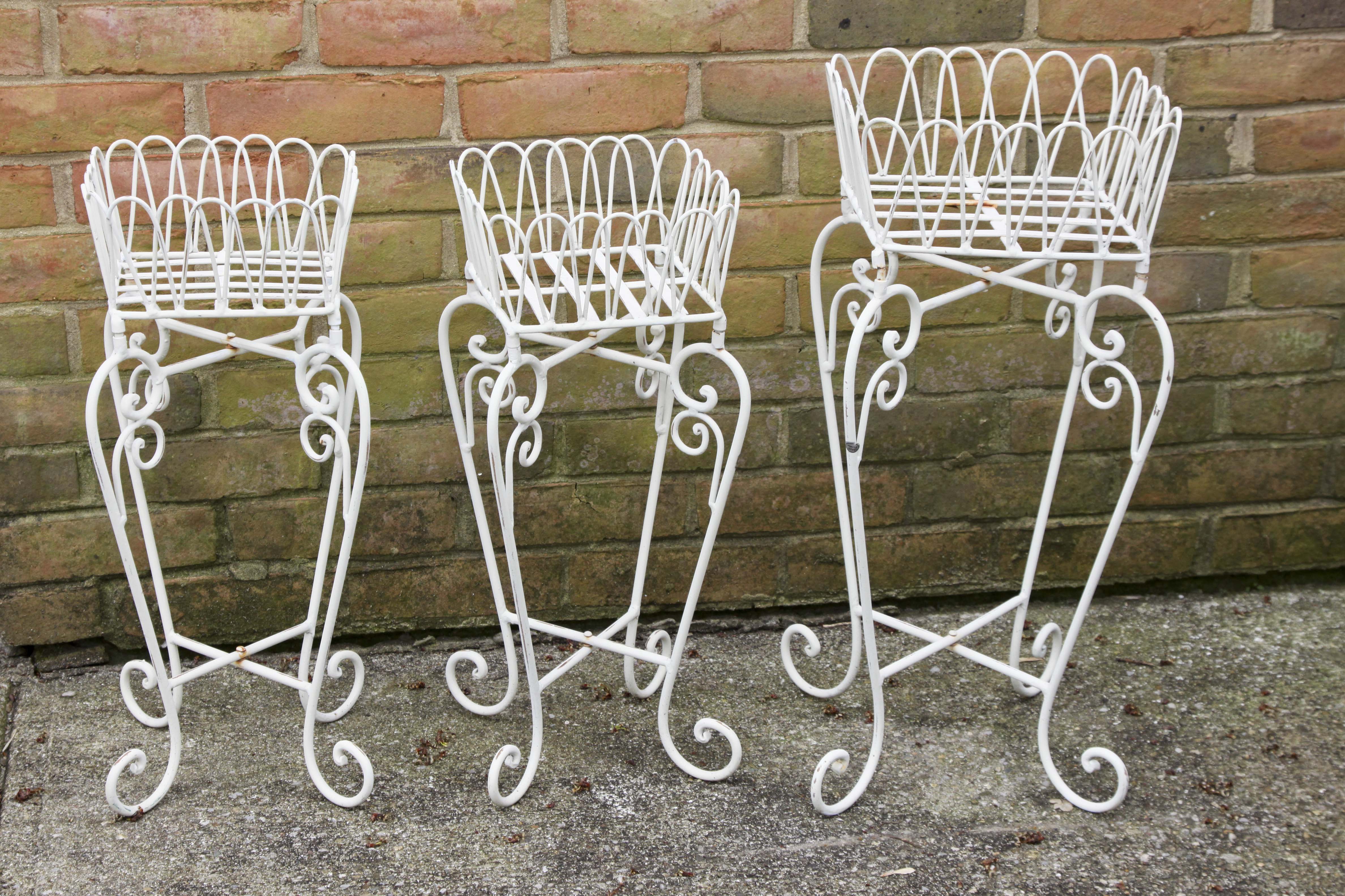 A Set of Off White Plant Stands.