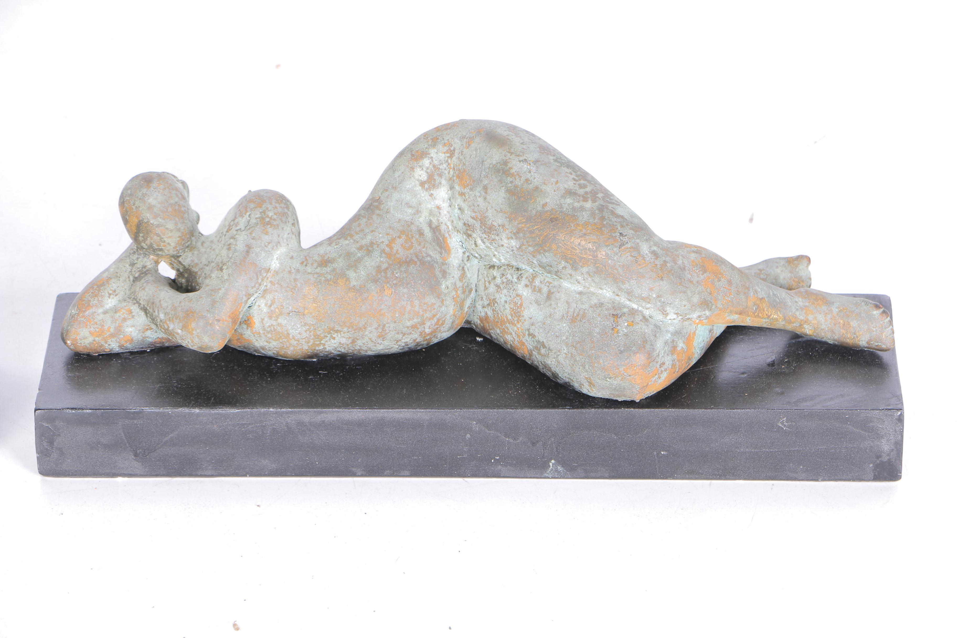 Pair of Sculptures of Lounging Figures