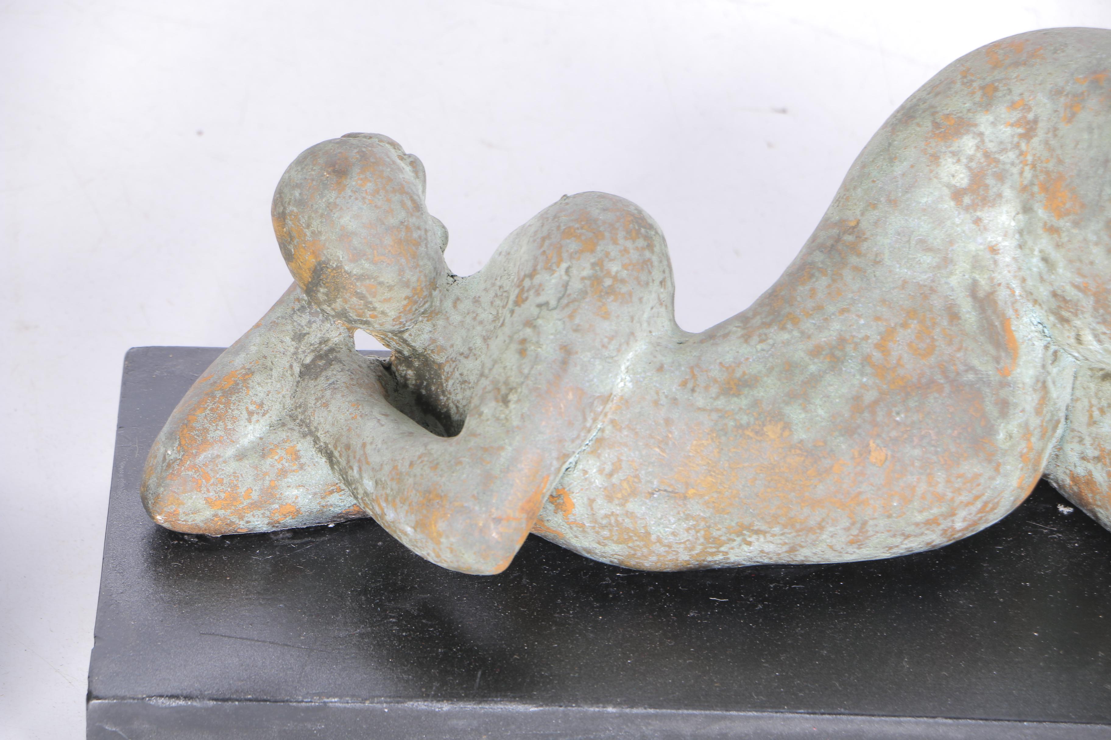 Pair of Sculptures of Lounging Figures