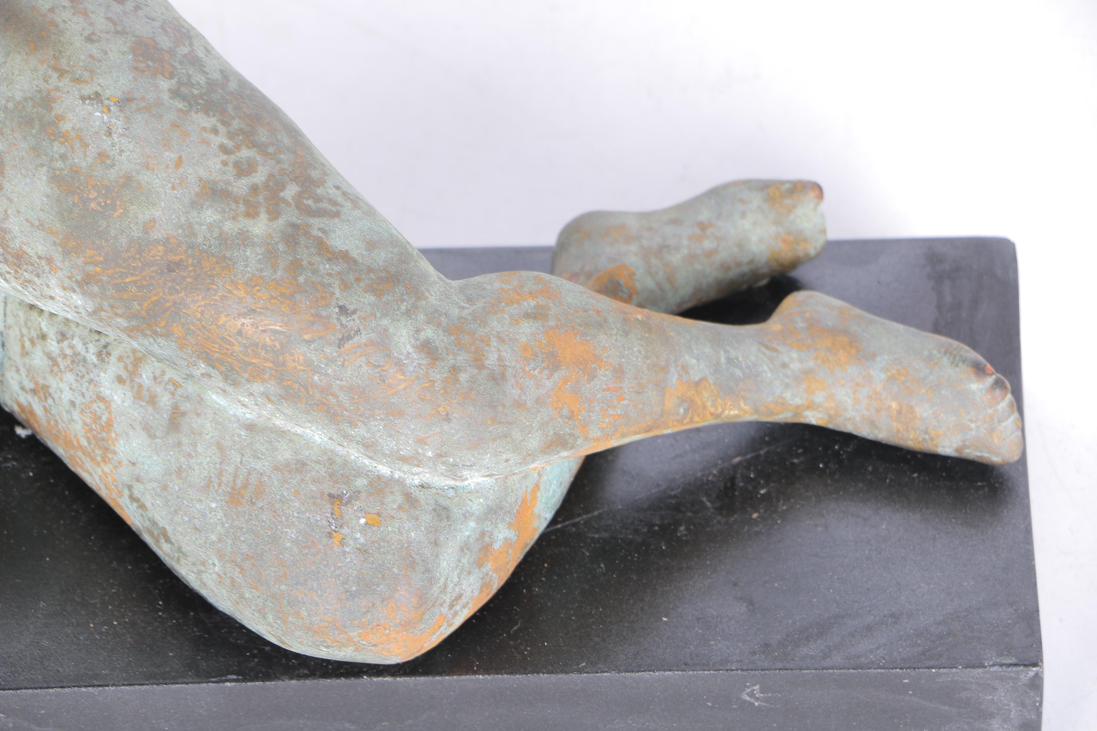 Pair of Sculptures of Lounging Figures