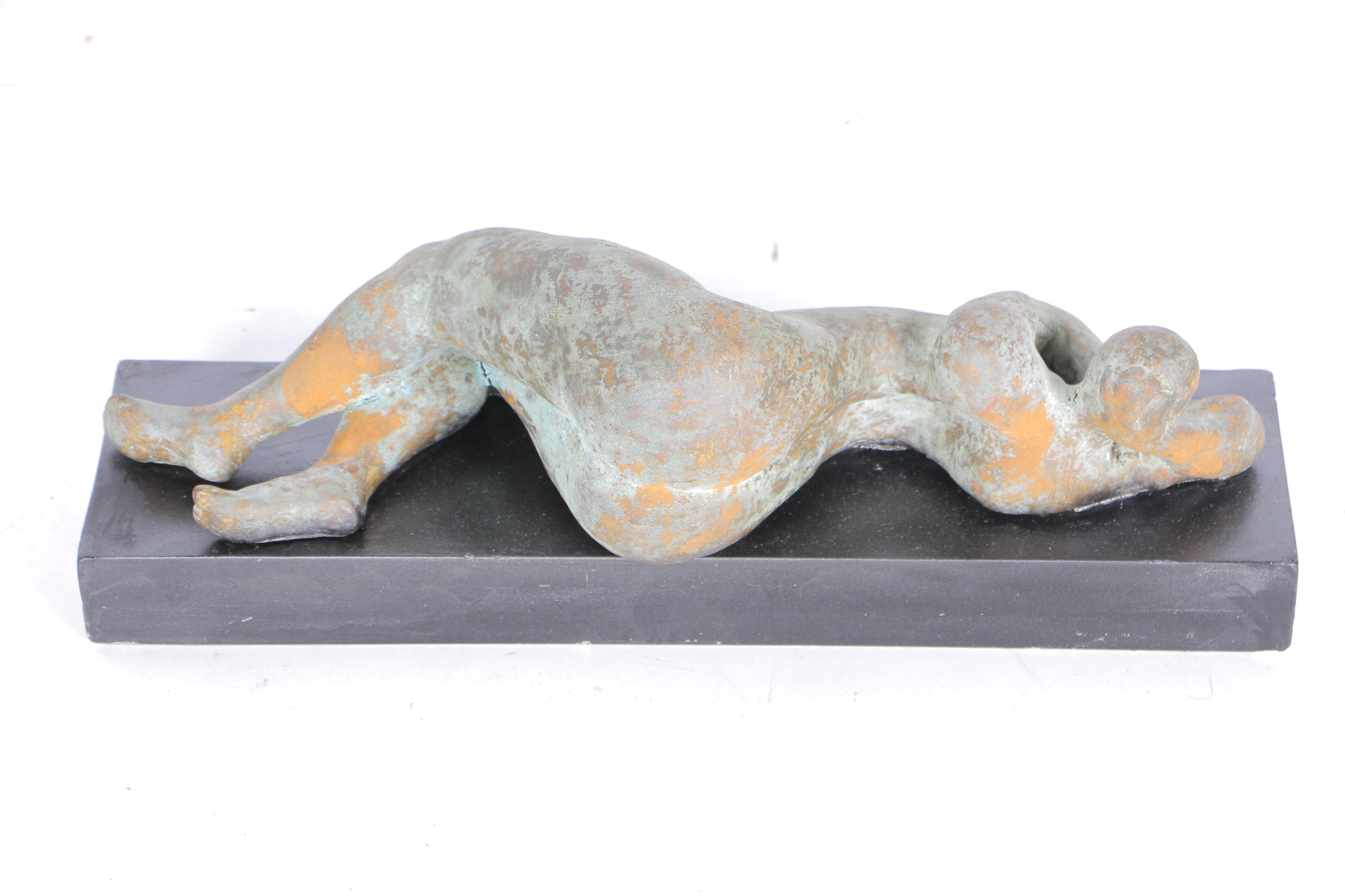 Pair of Sculptures of Lounging Figures