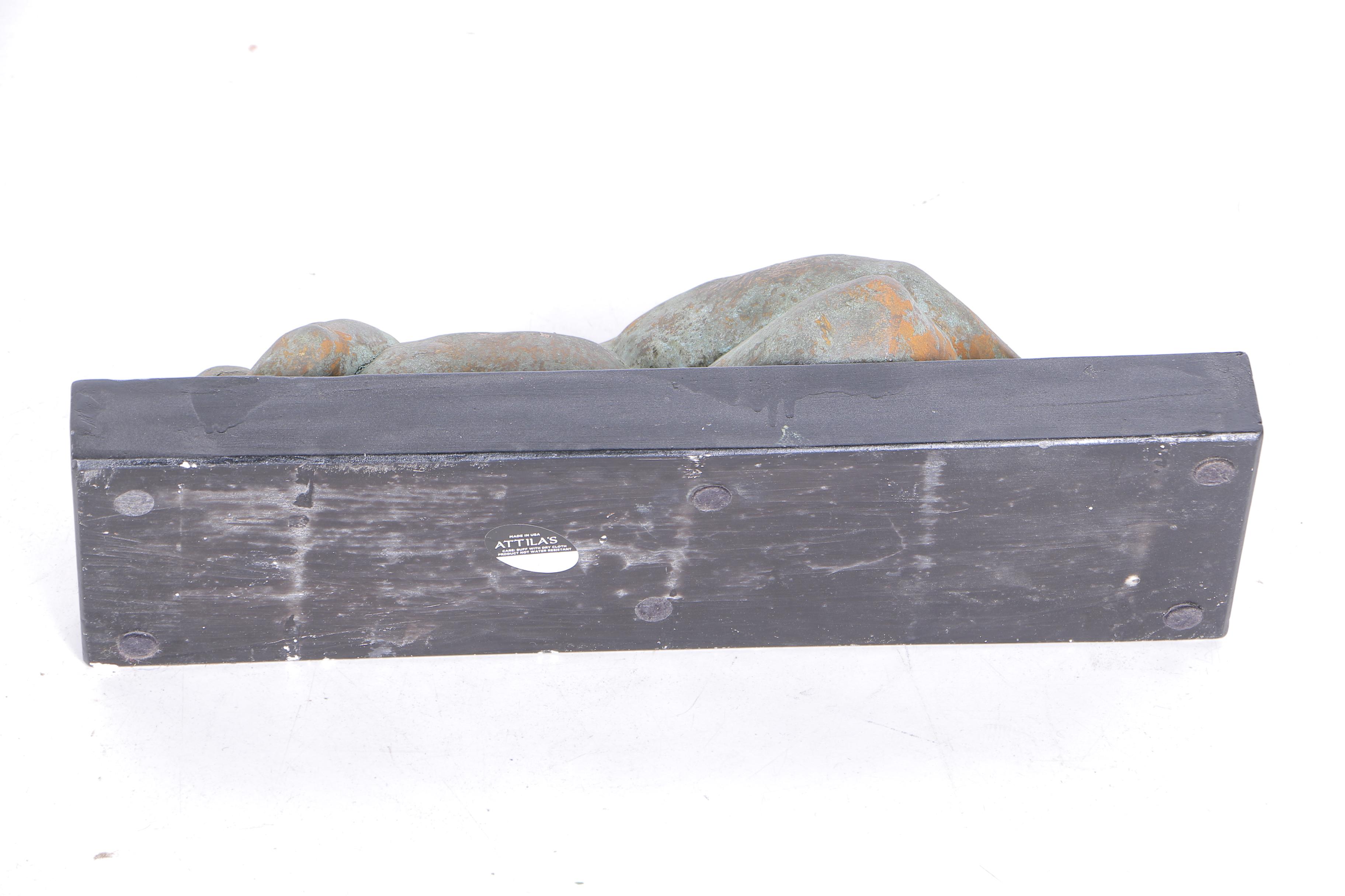 Pair of Sculptures of Lounging Figures