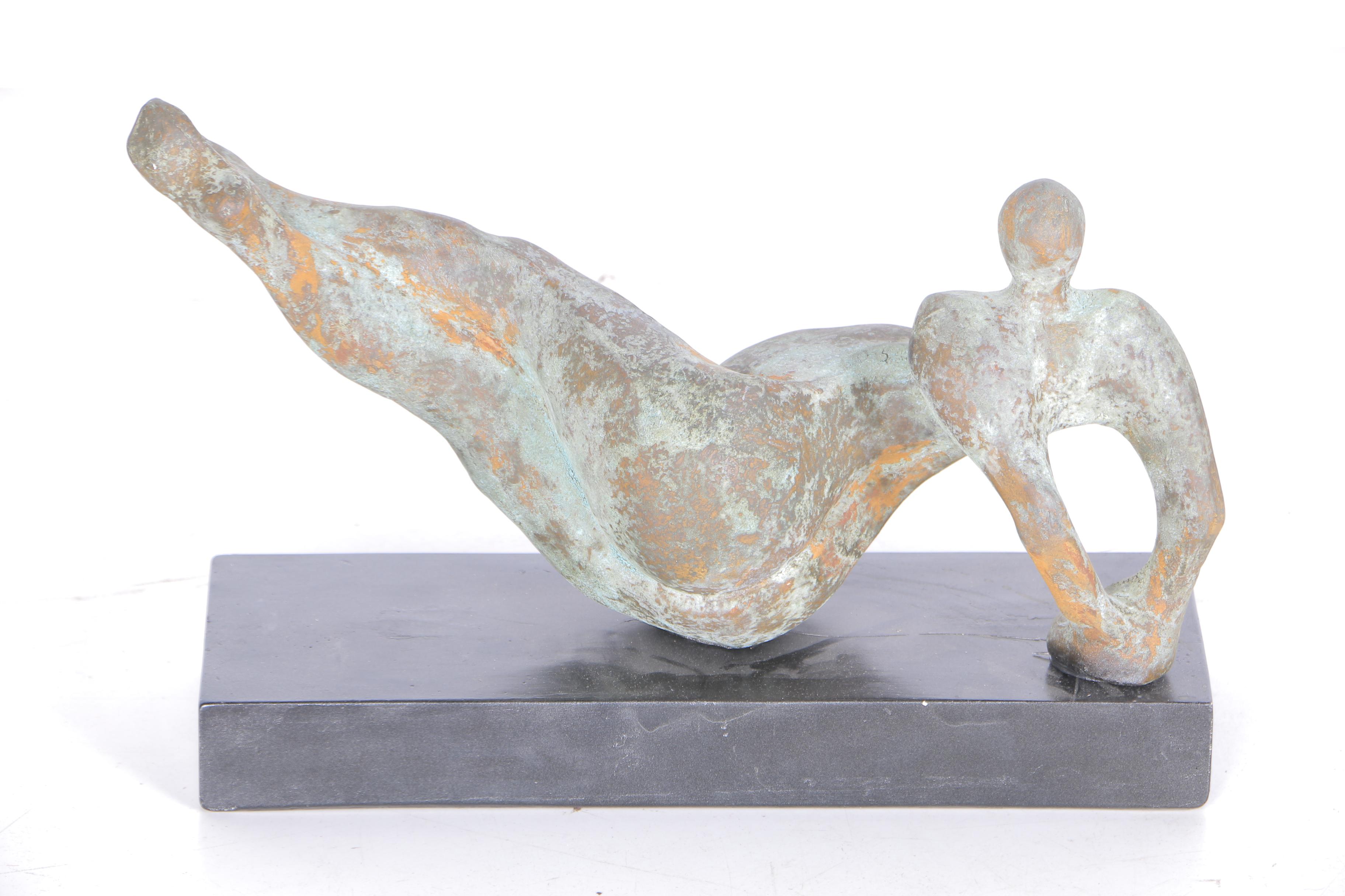 Pair of Sculptures of Lounging Figures