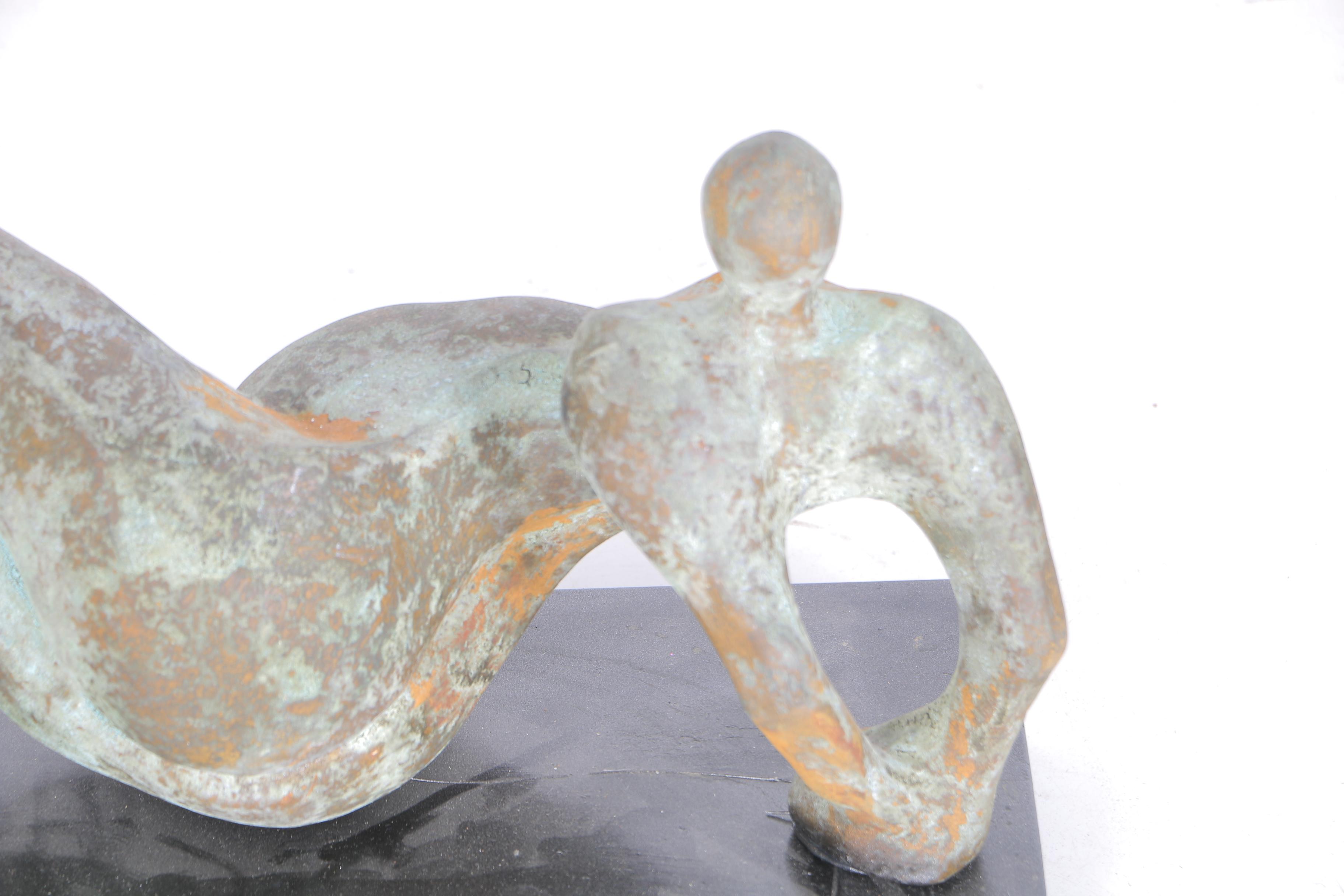 Pair of Sculptures of Lounging Figures