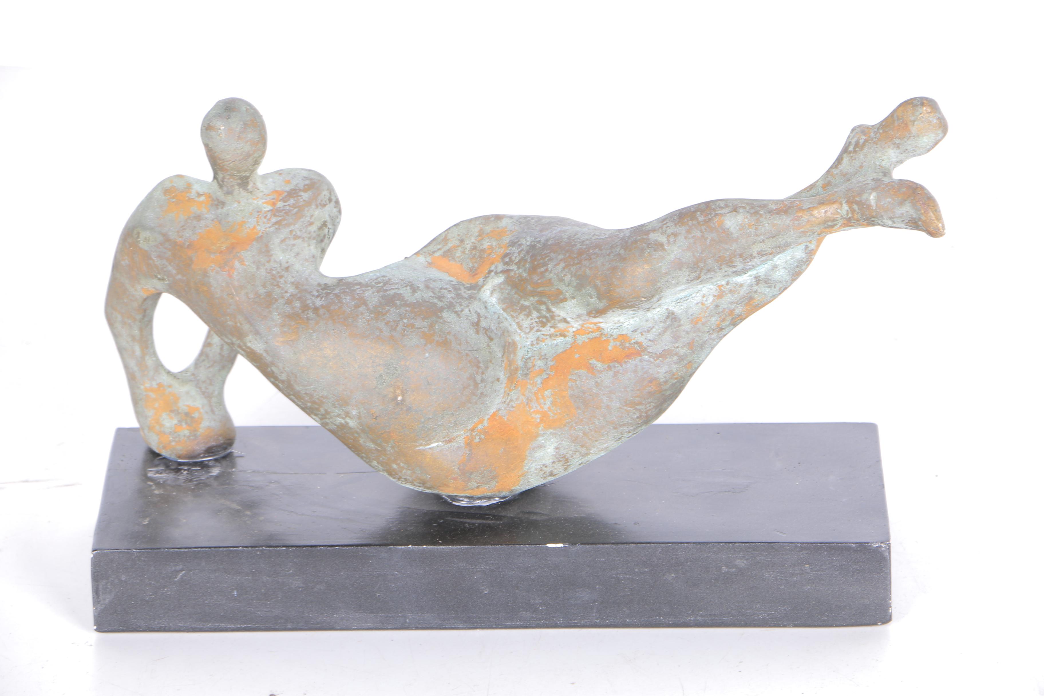 Pair of Sculptures of Lounging Figures