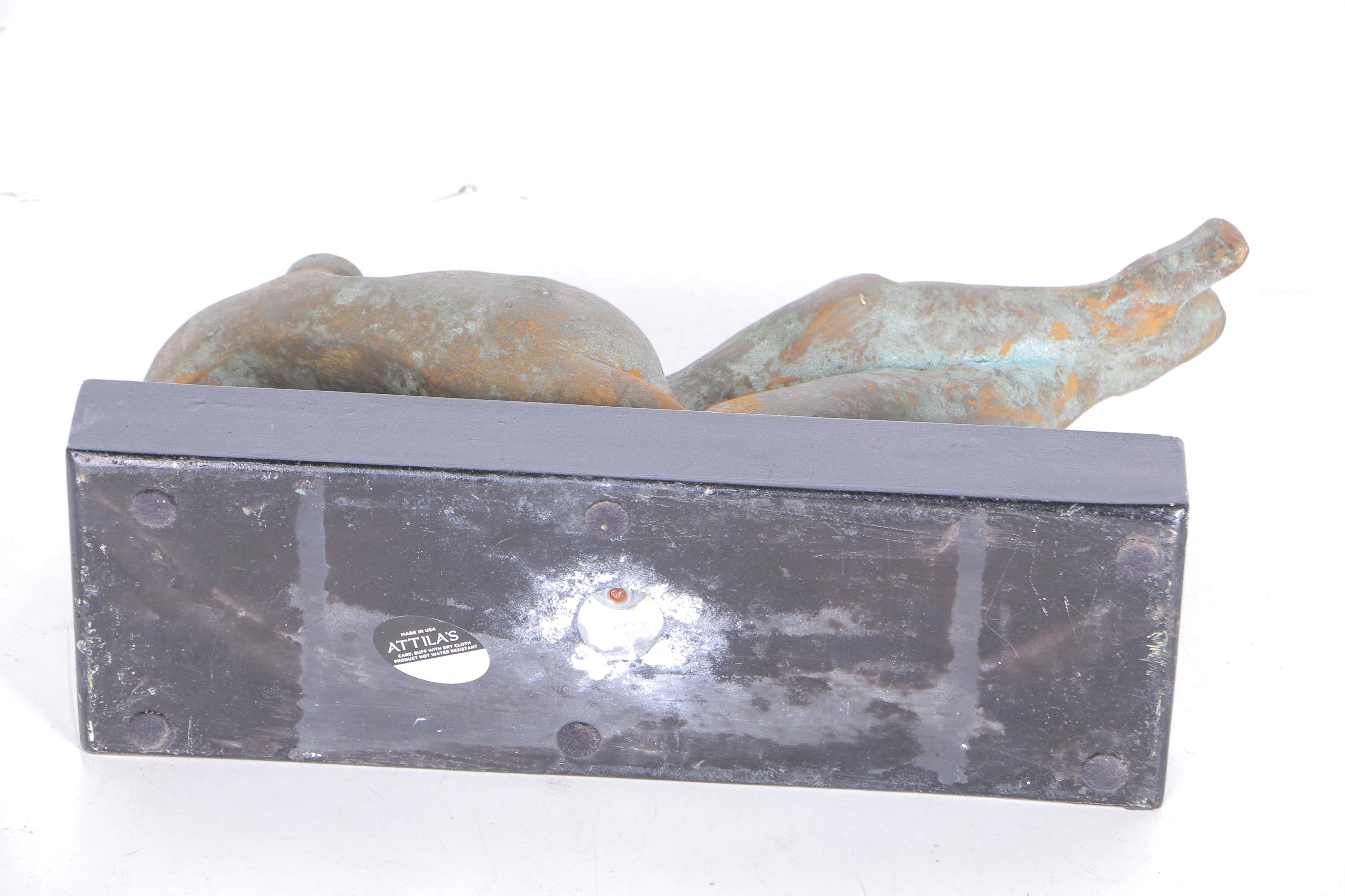 Pair of Sculptures of Lounging Figures