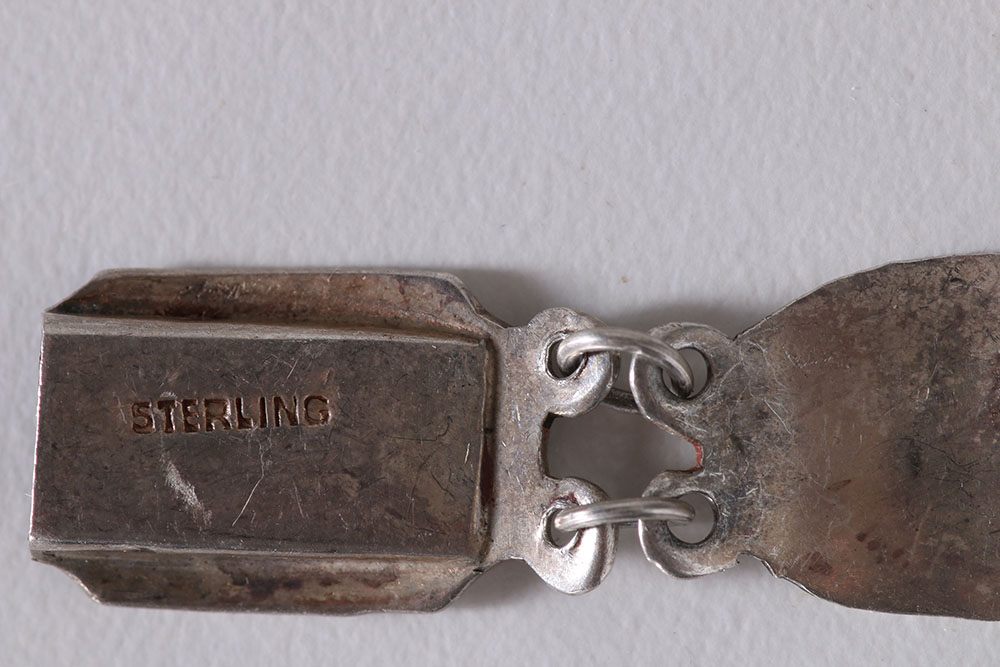 Sterling Silver Jewelry Including Earrings, Brooch, and Link Bracelet