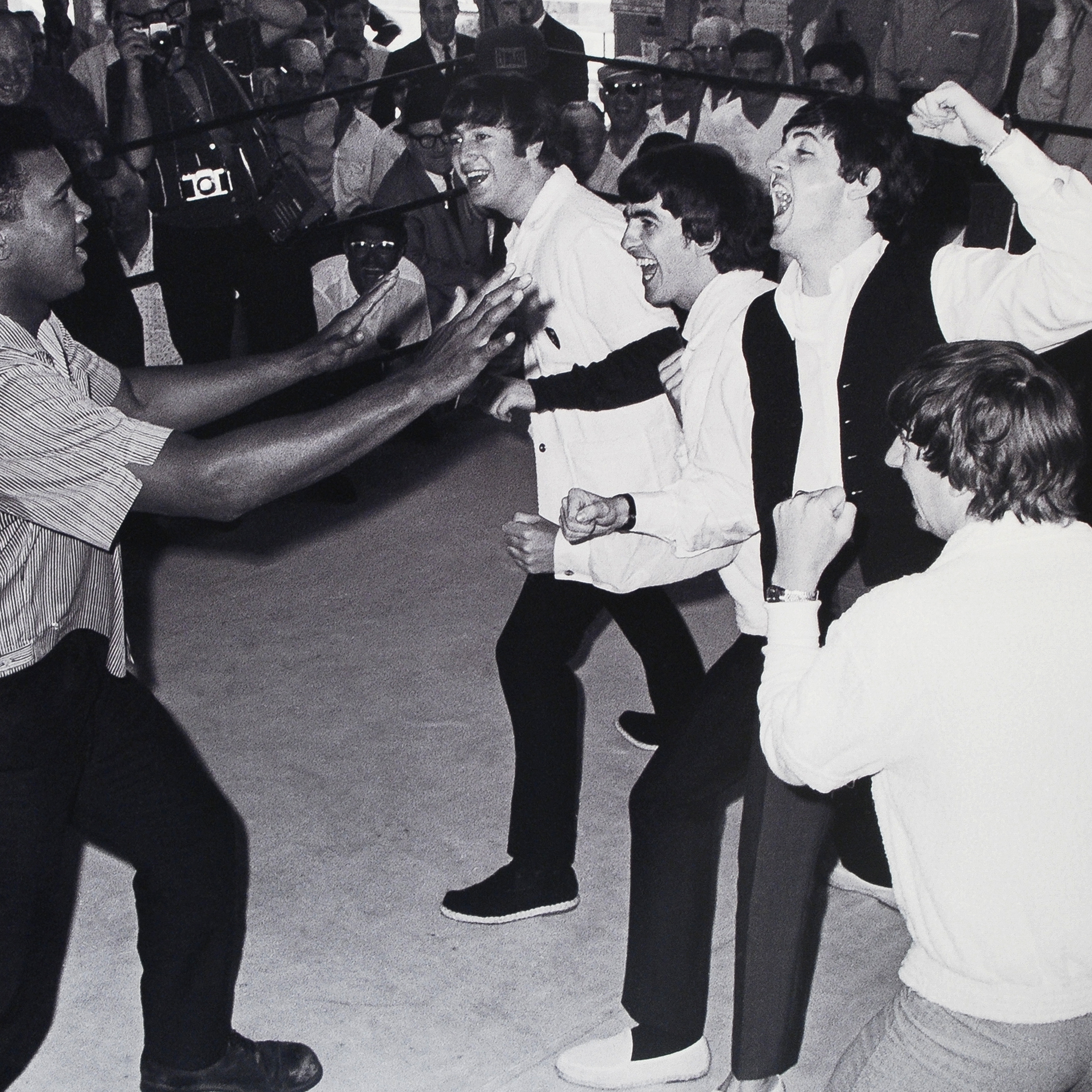 Photograph of Muhammad Ali and and The Beatles