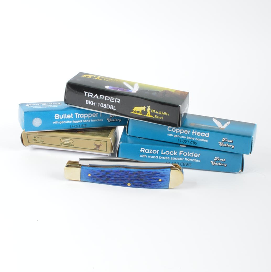 Collection of Frost Cutlery and Whitetail Cutlery Pocket Knives