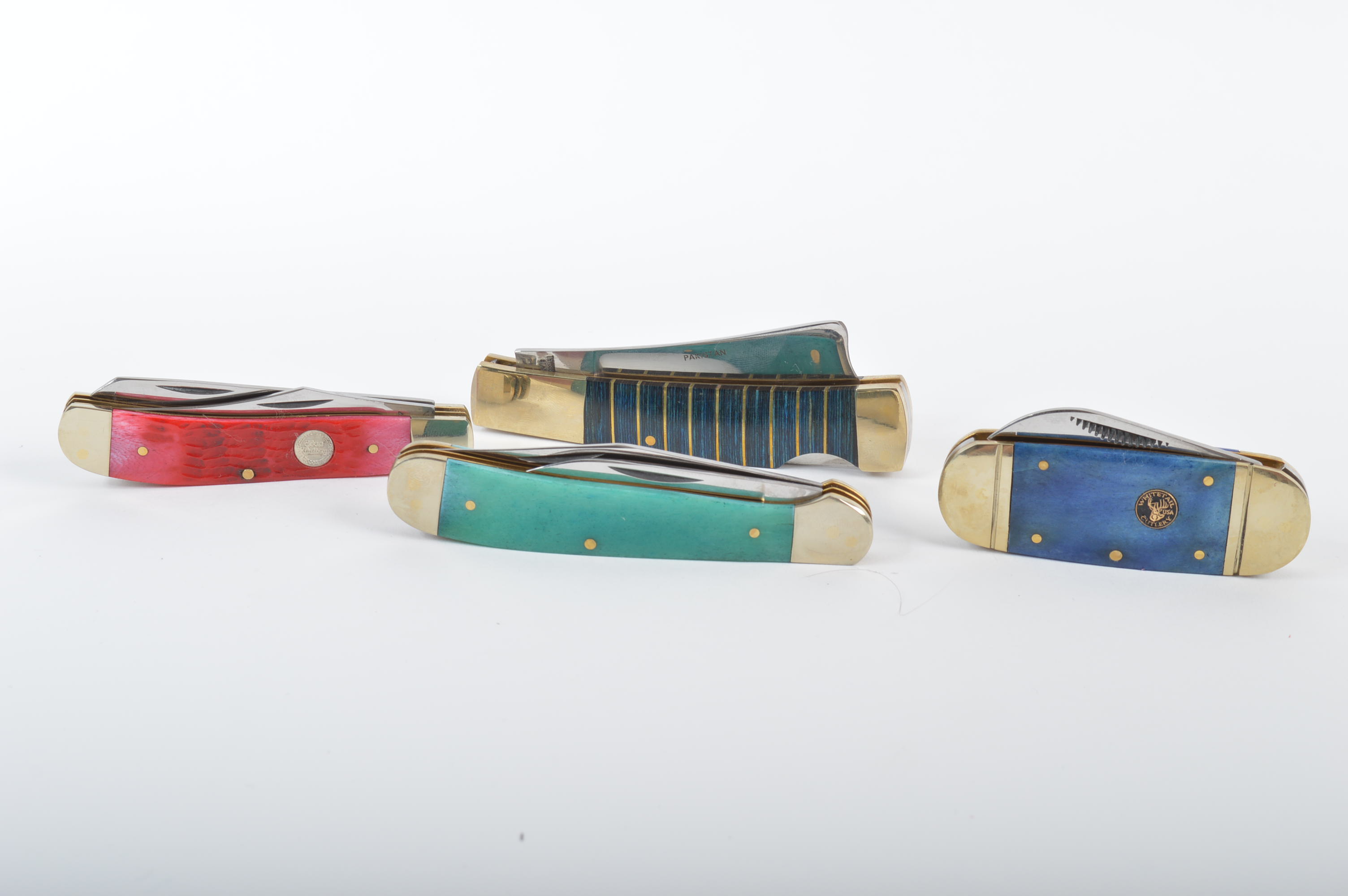 Collection of Frost Cutlery and Whitetail Cutlery Pocket Knives