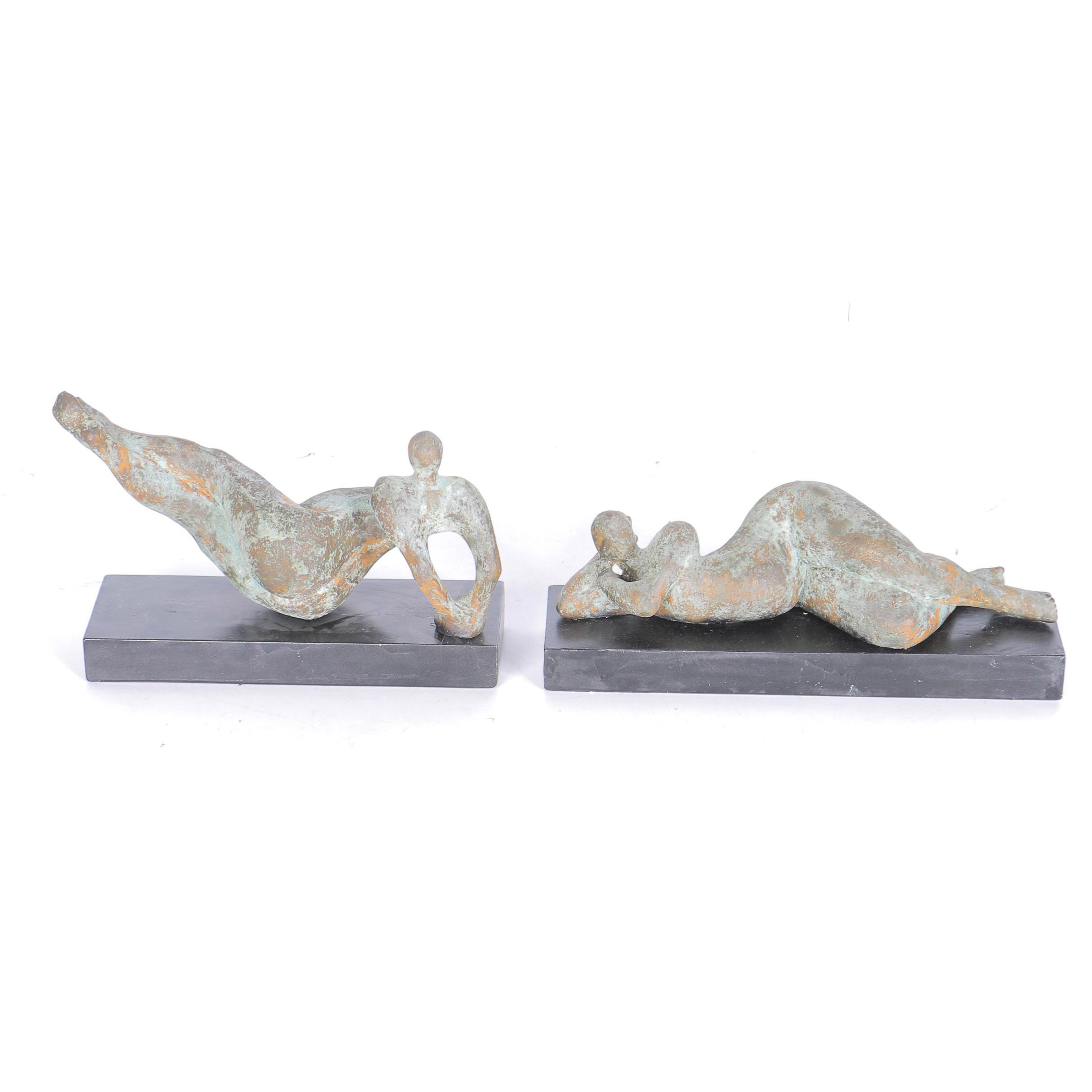 Pair of Sculptures of Lounging Figures