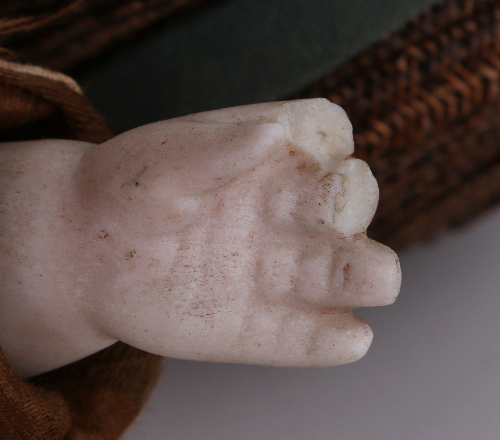 Antique Hand-Painted Bisque Doll With Inset Eyes and Leather Body