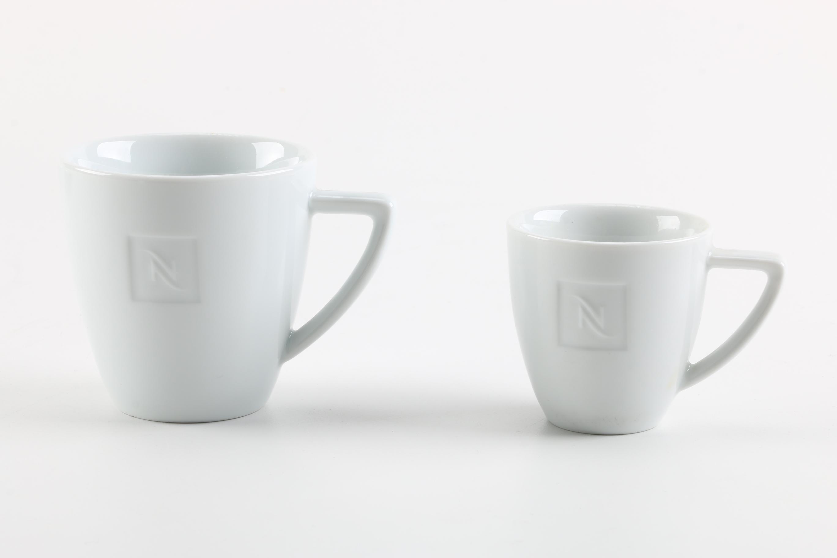 Collection of Nespresso Cups, Saucers and Spoons