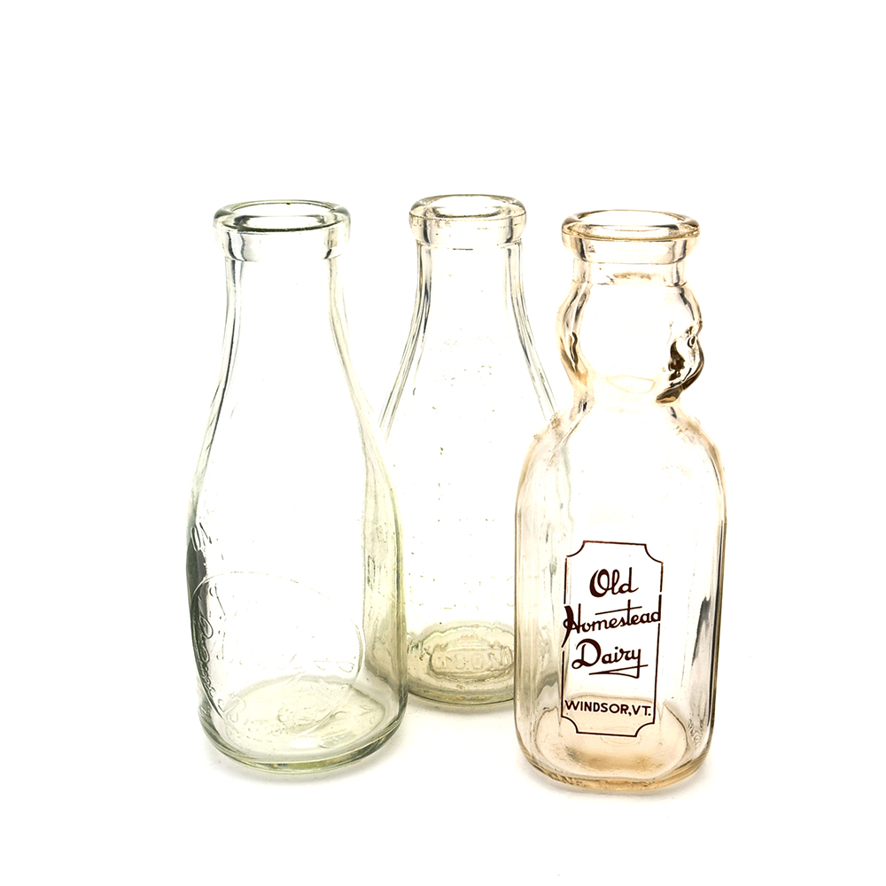Three Vintage Milk Bottles