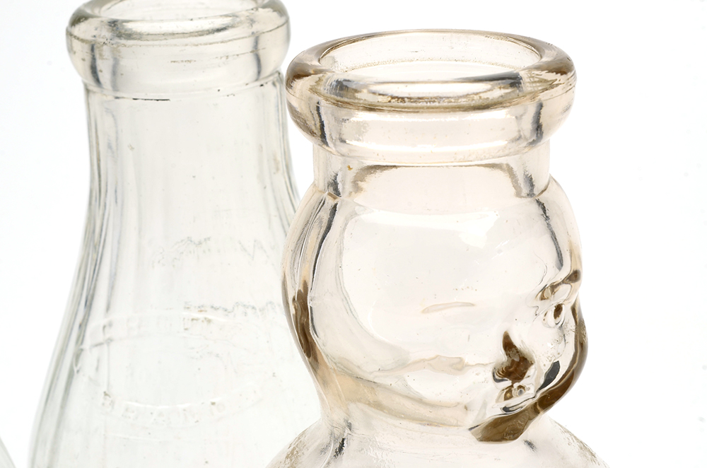 Three Vintage Milk Bottles