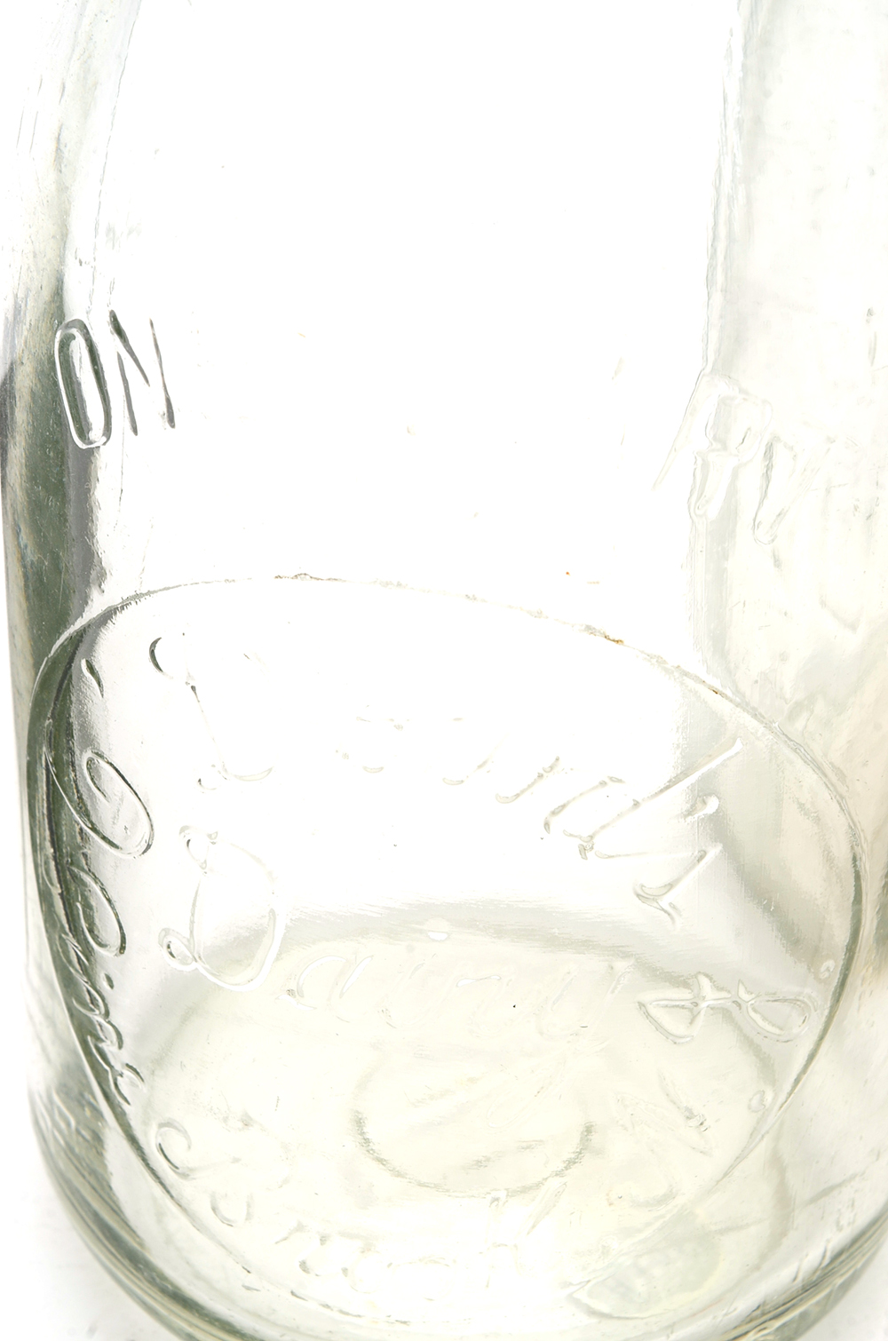 Three Vintage Milk Bottles