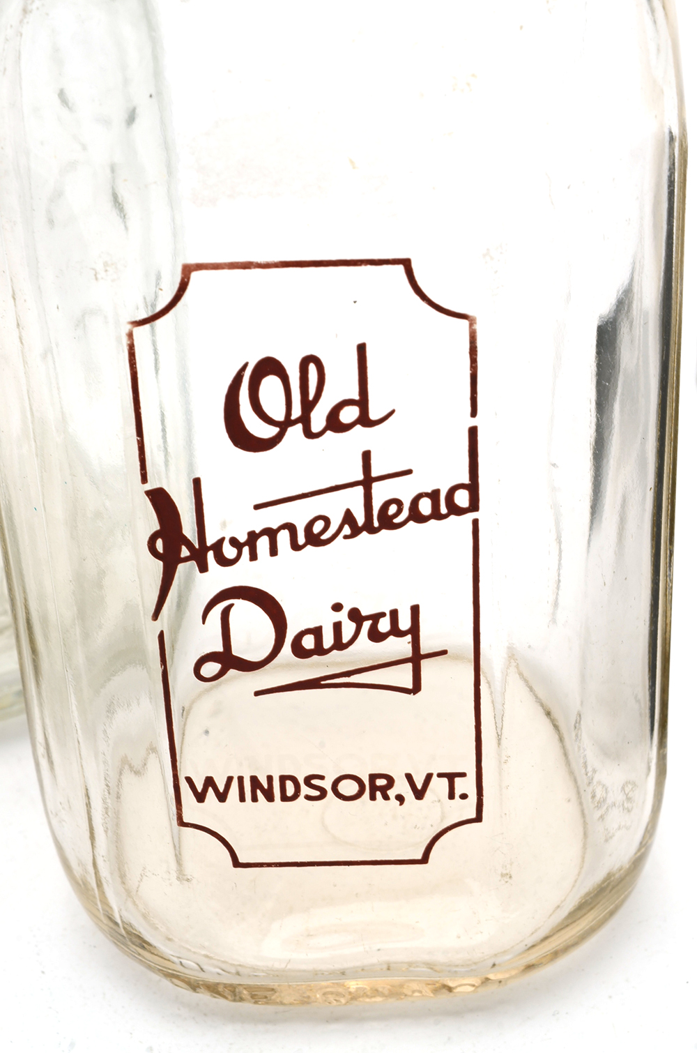 Three Vintage Milk Bottles