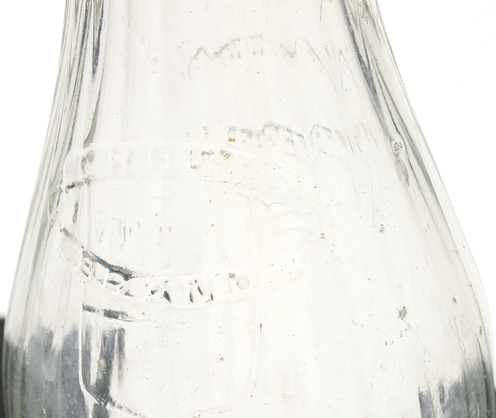 Three Vintage Milk Bottles