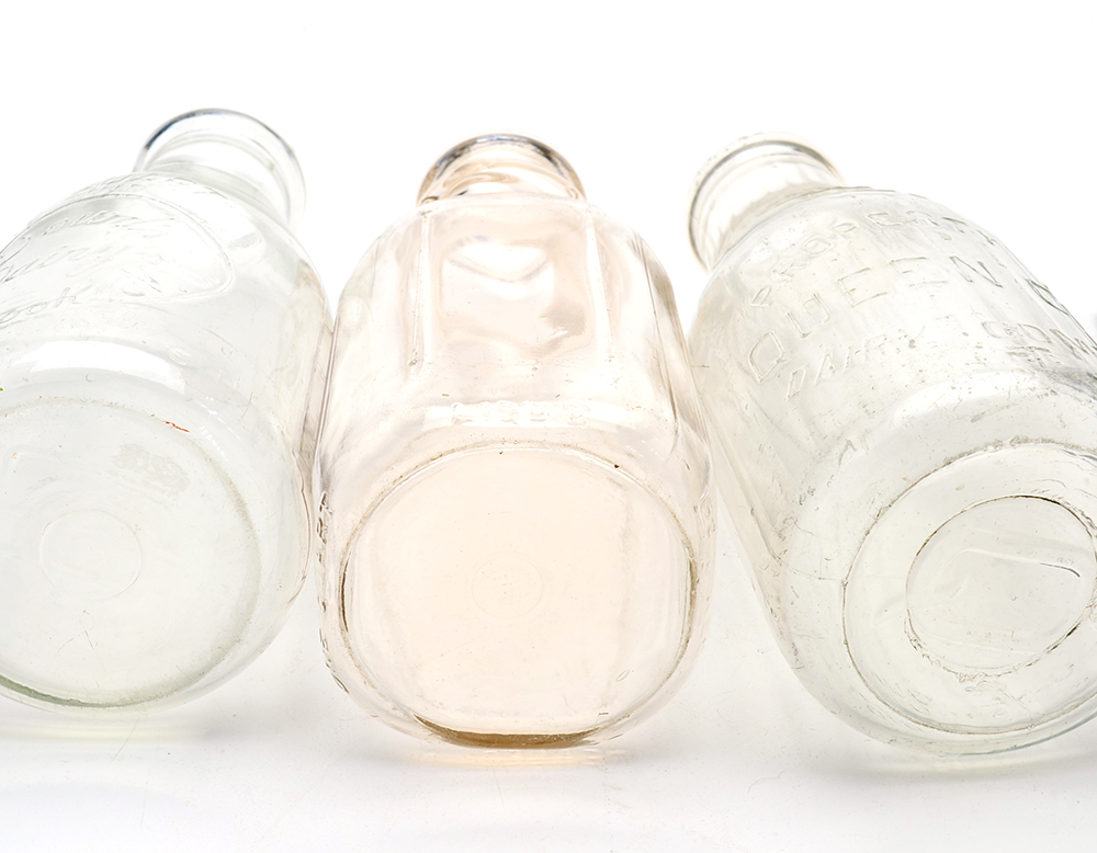 Three Vintage Milk Bottles