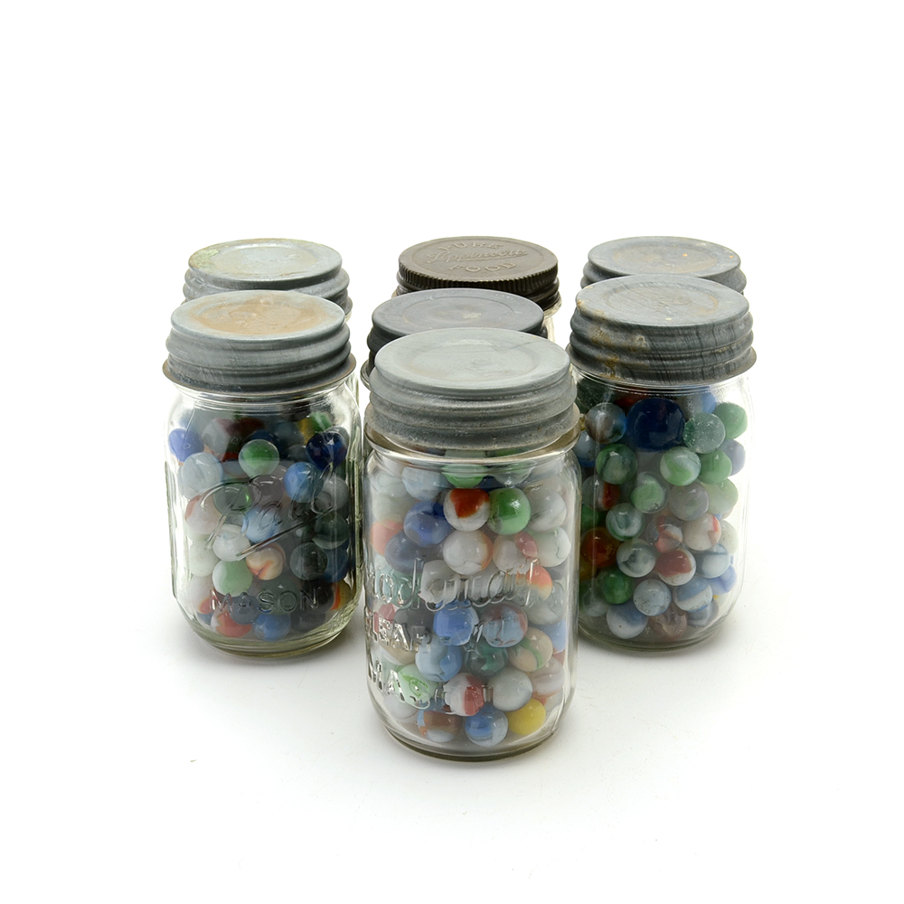 Seven Vintage Jars of Marbles in Crate.
