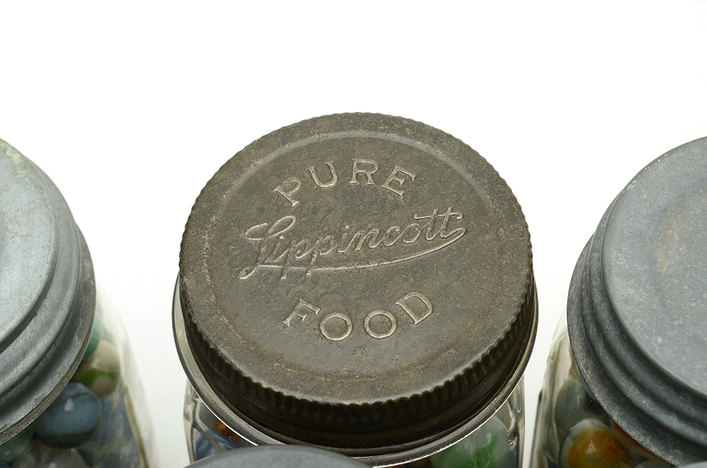 Seven Vintage Jars of Marbles in Crate.