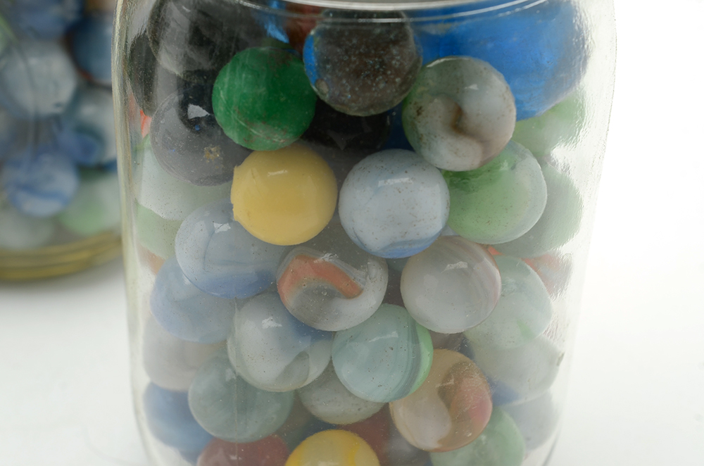 Seven Vintage Jars of Marbles in Crate.