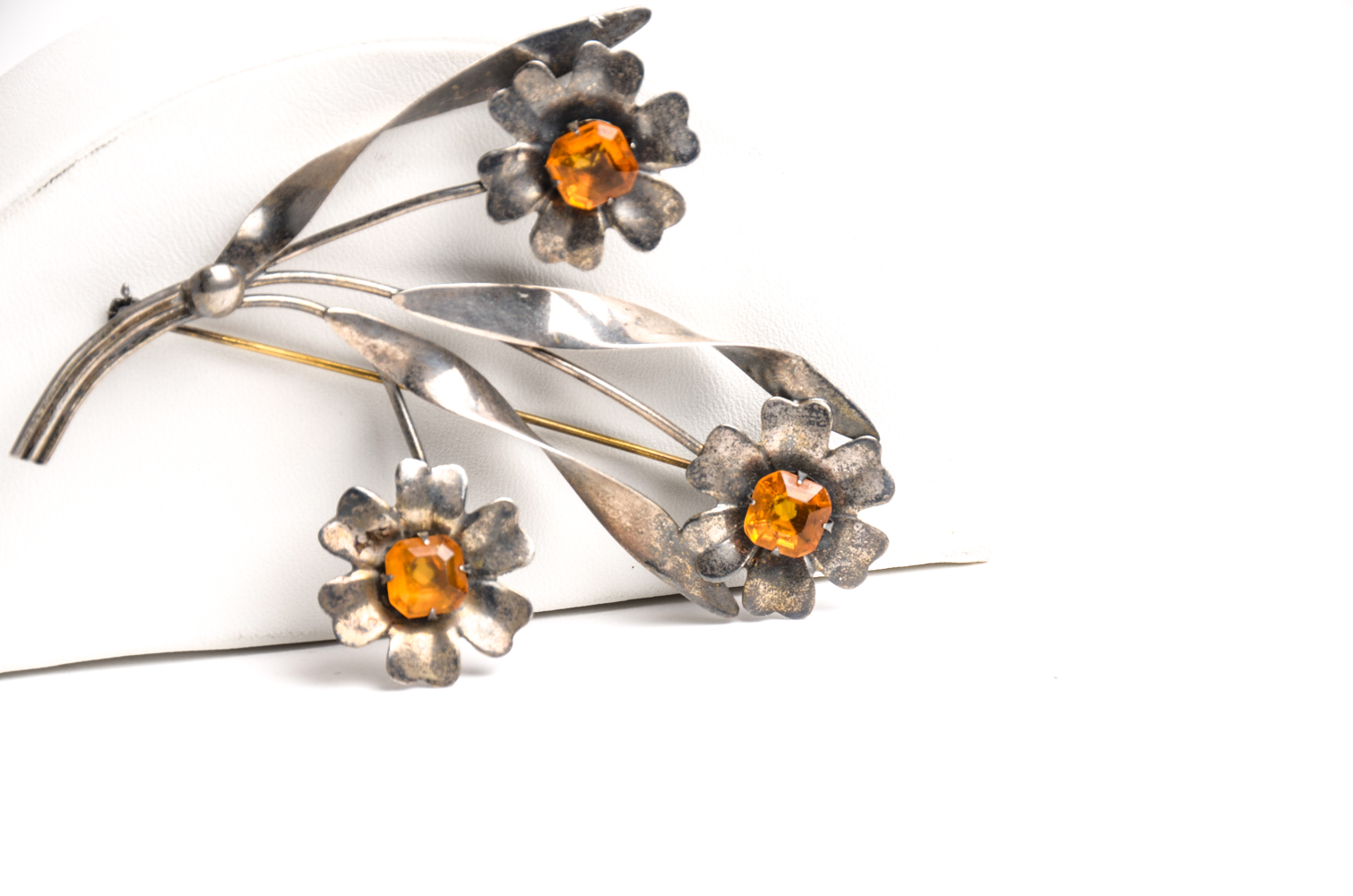 Pair of Sterling Bracelets and Floral Brooch