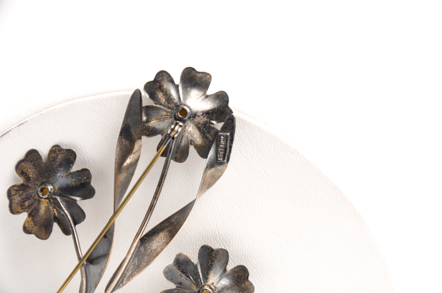 Pair of Sterling Bracelets and Floral Brooch