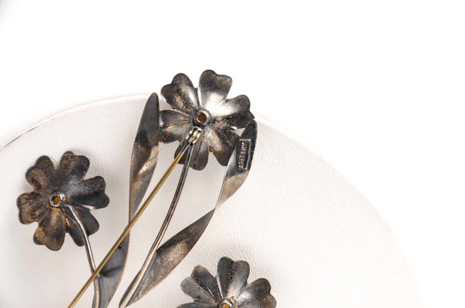 Pair of Sterling Bracelets and Floral Brooch