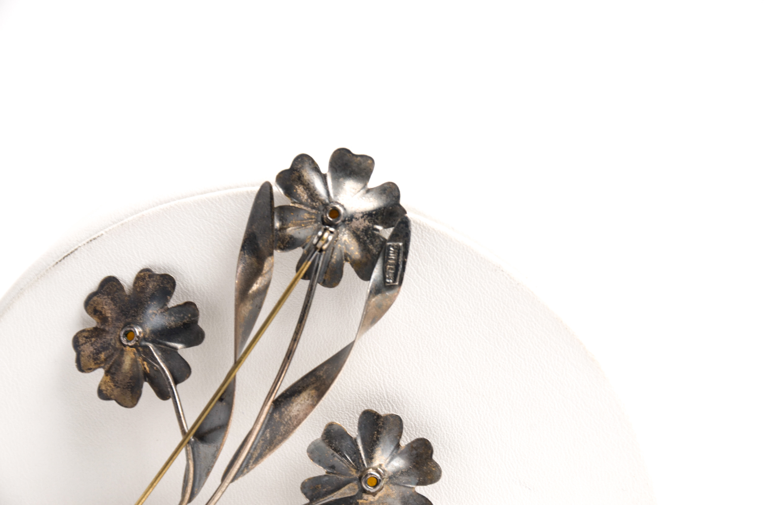 Pair of Sterling Bracelets and Floral Brooch