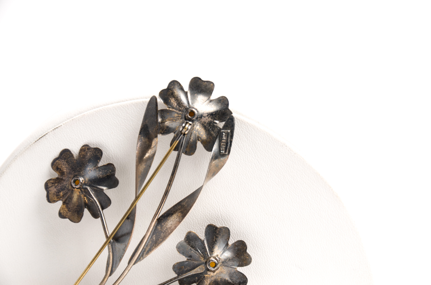 Pair of Sterling Bracelets and Floral Brooch