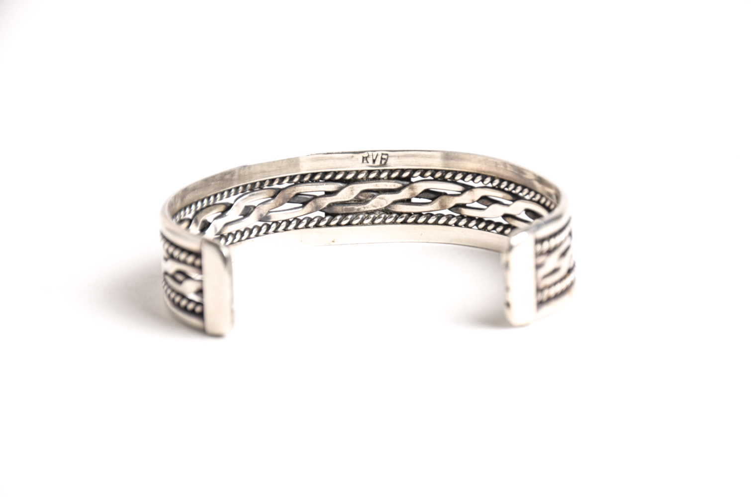 Pair of Sterling Bracelets and Floral Brooch