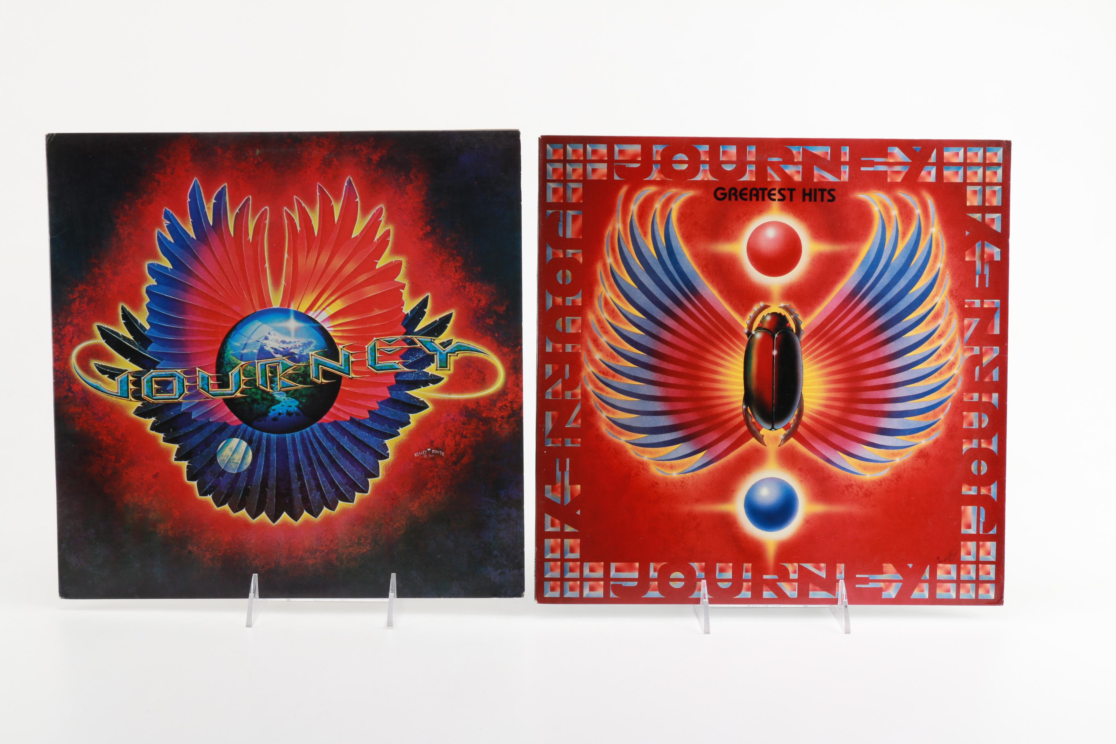 Boston, Journey, and Foreigner LPs