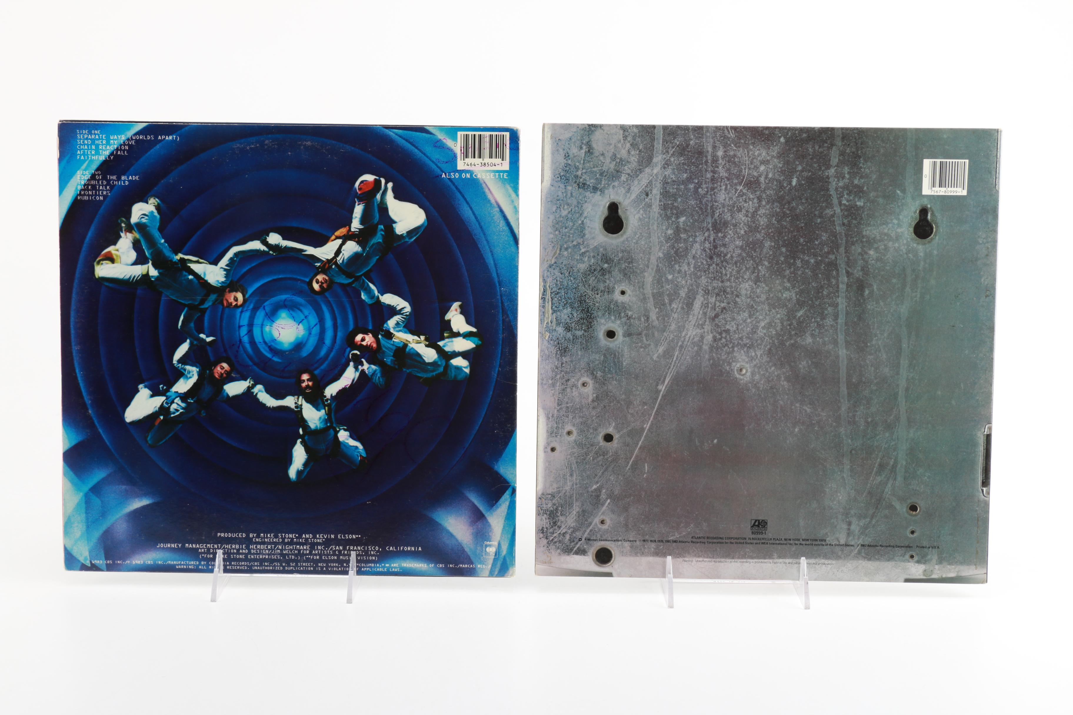 Boston, Journey, and Foreigner LPs