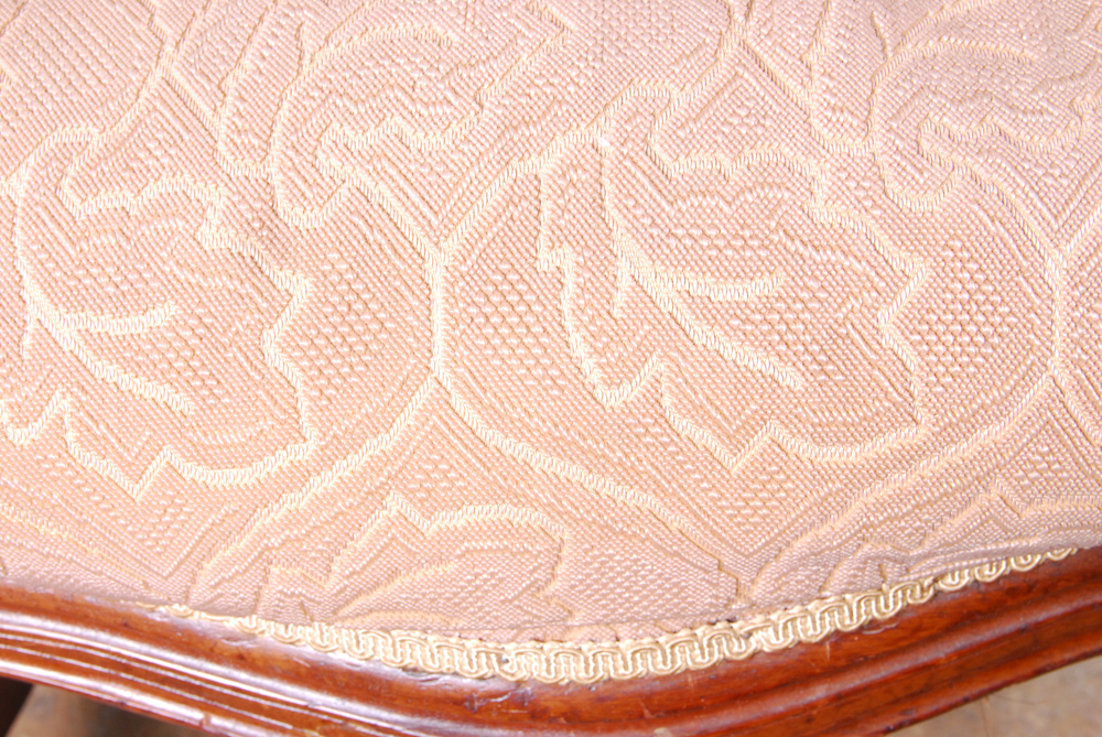 Pink Upholstered Rocking Armchair