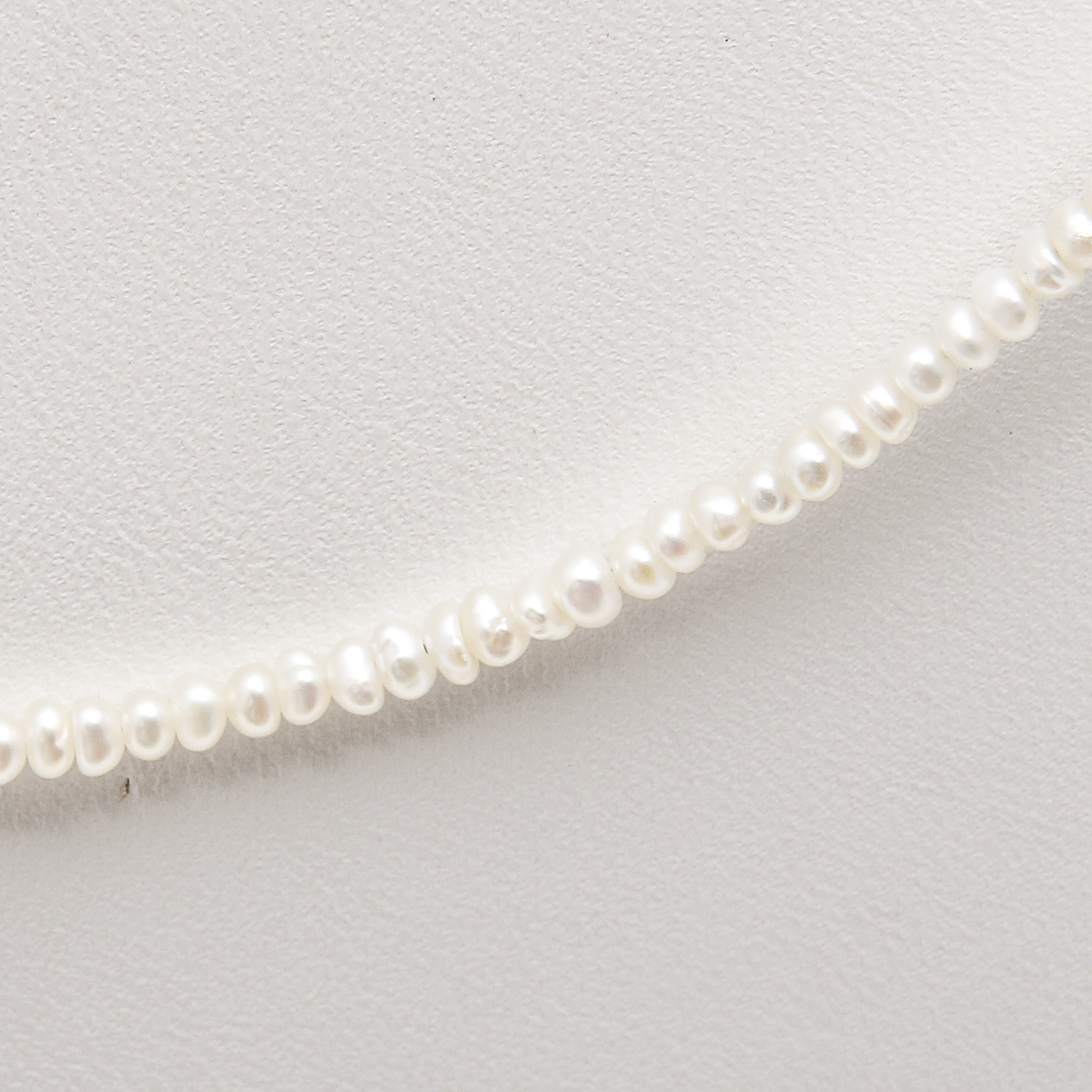 Artisan Crafted Seed Pearl Necklace with Multicolored Pearl Drop