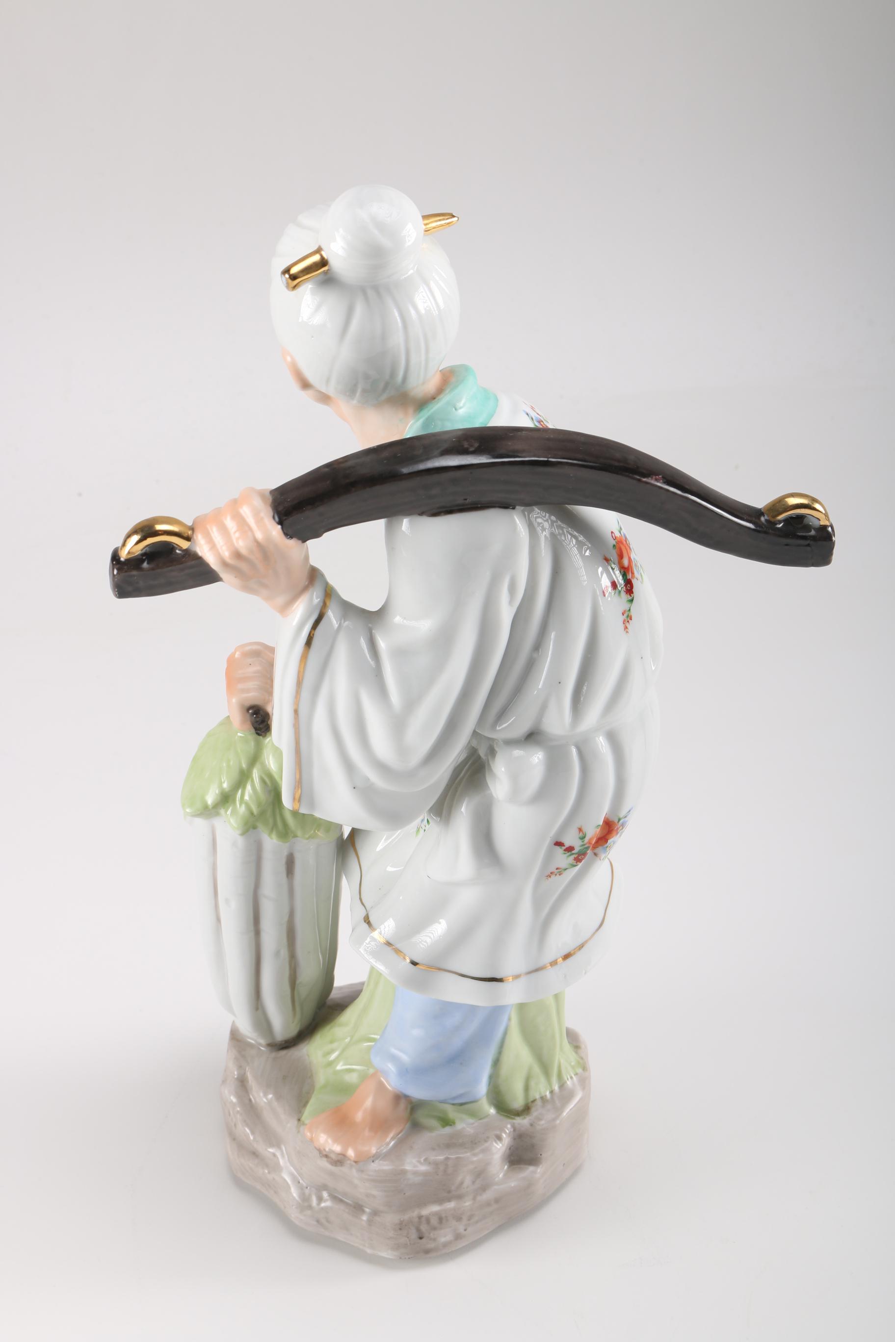 Japanese Man And Woman Figurines
