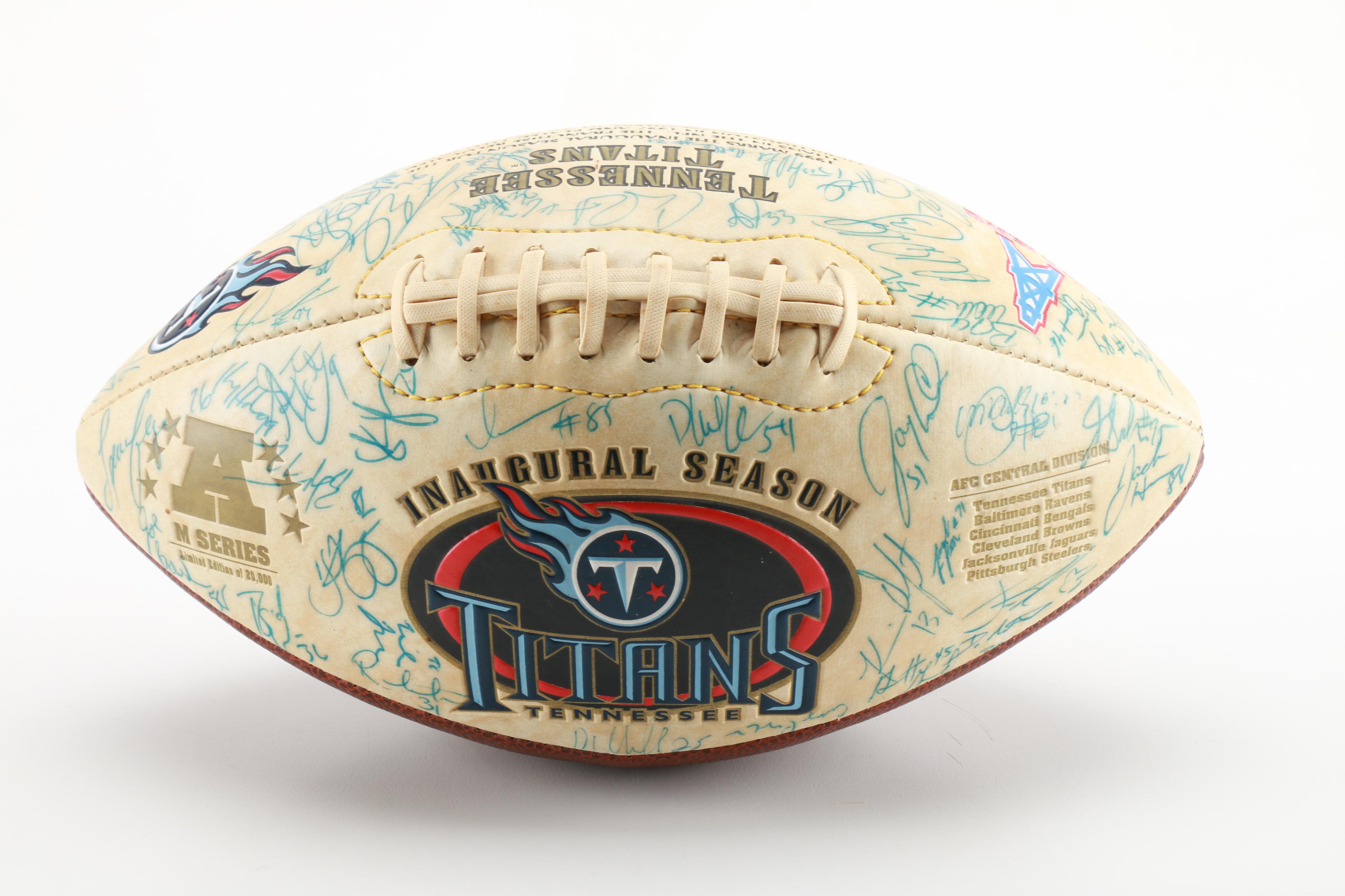 Autographed Tennessee Titans Inaugural Season Football and 1999 Replica Brass Tennessee Titans Ring.