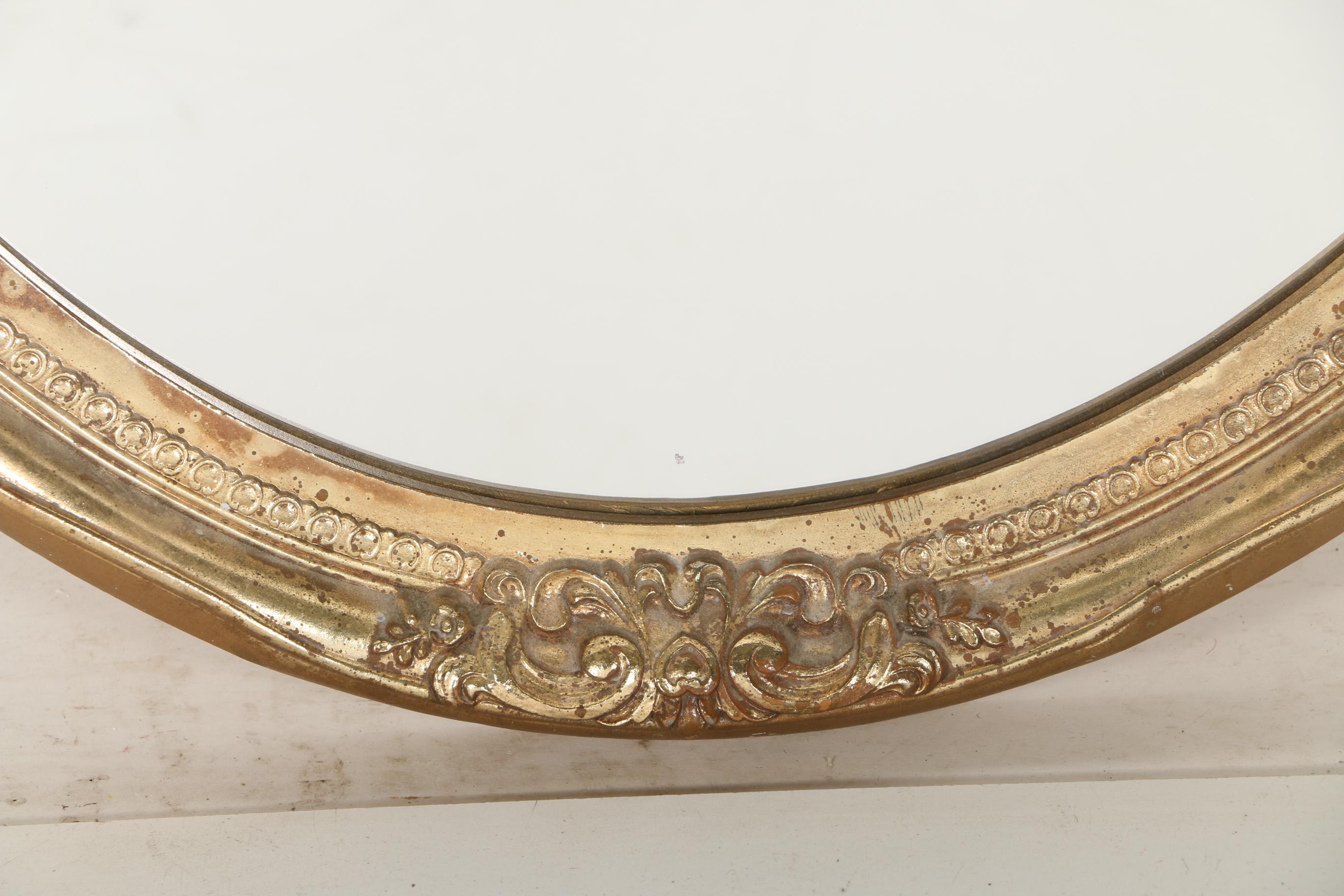 Gilded Oval Wall Mirror
