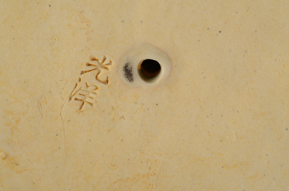 Japanese Ceramic Figure with Sang de Boeuf Glaze