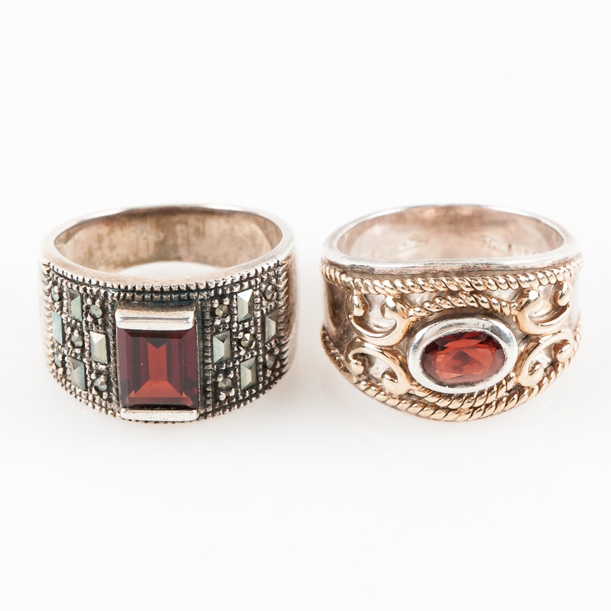 Pair of Thai Sterling Silver, 14K Yellow Gold, and Garnet Barrel Rings