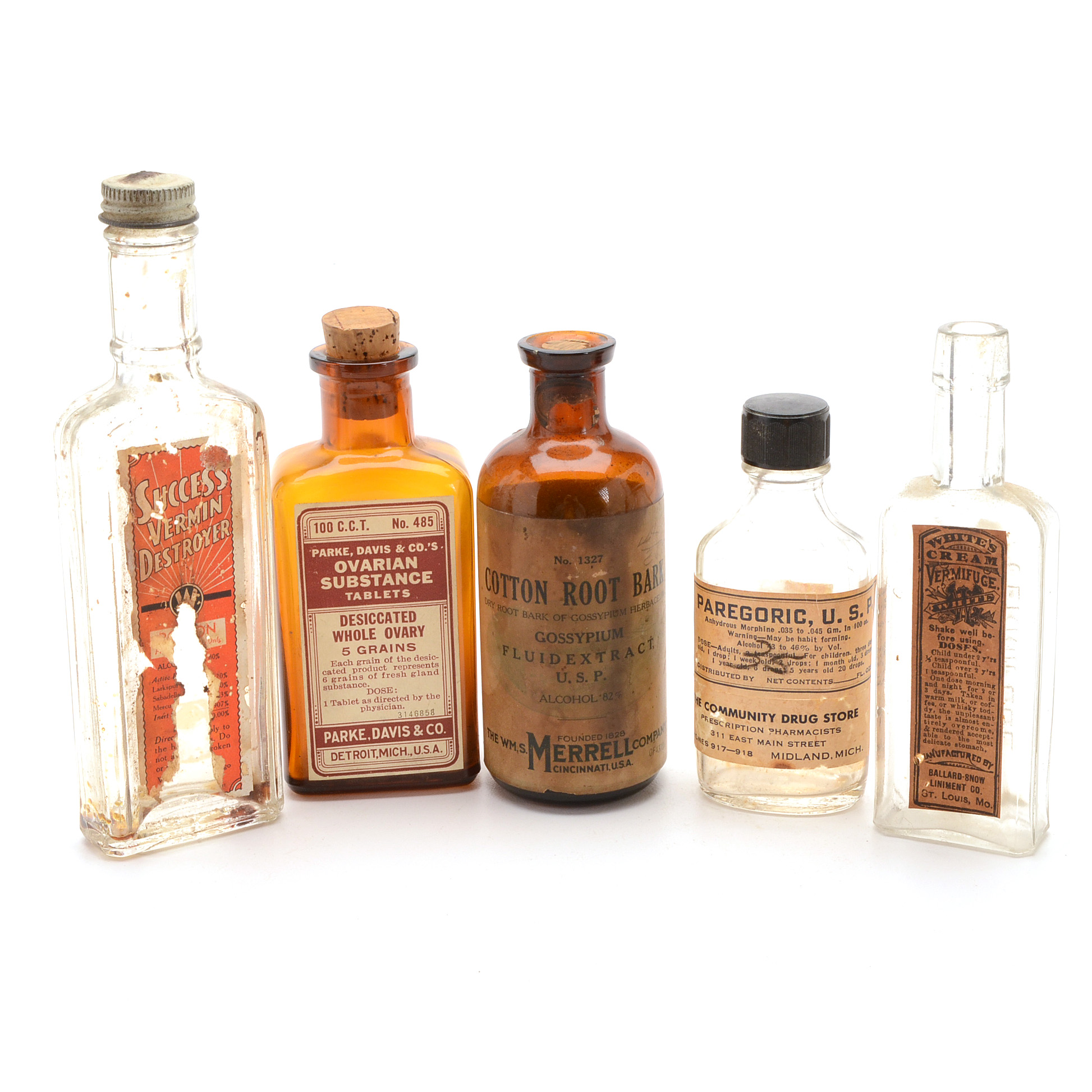 Five Vintage Medicine Bottles with Labels