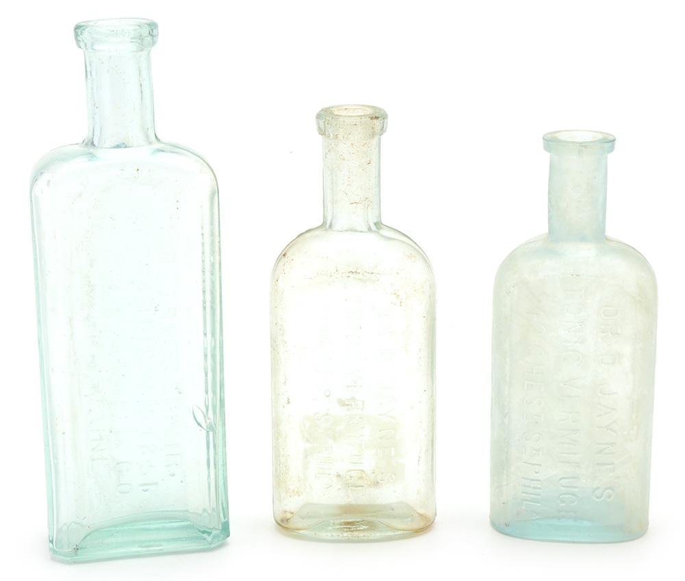 Sixteen Vintage Worm Remedy Bottles