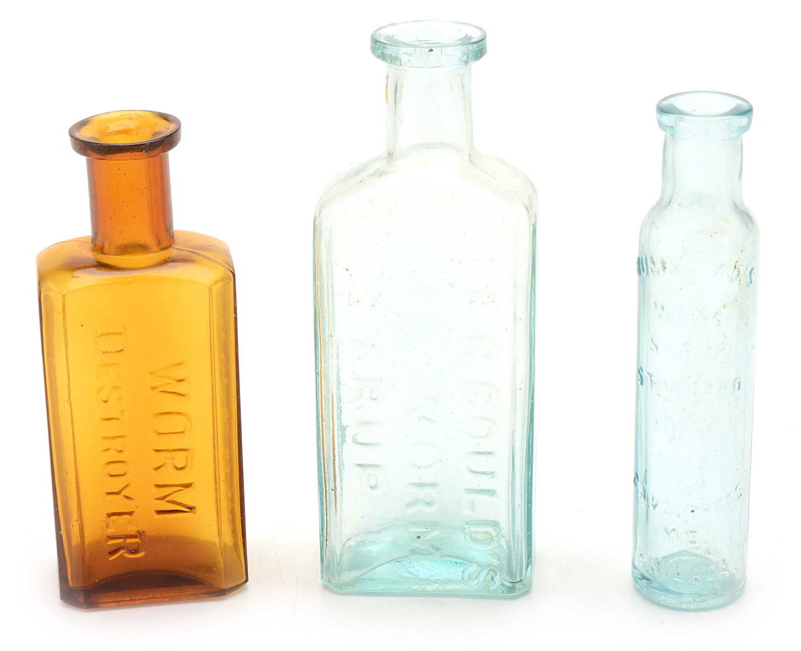 Sixteen Vintage Worm Remedy Bottles