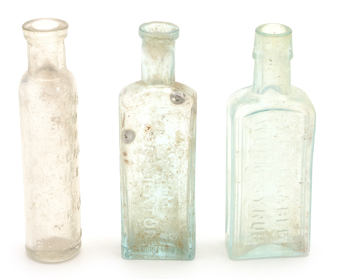 Sixteen Vintage Worm Remedy Bottles