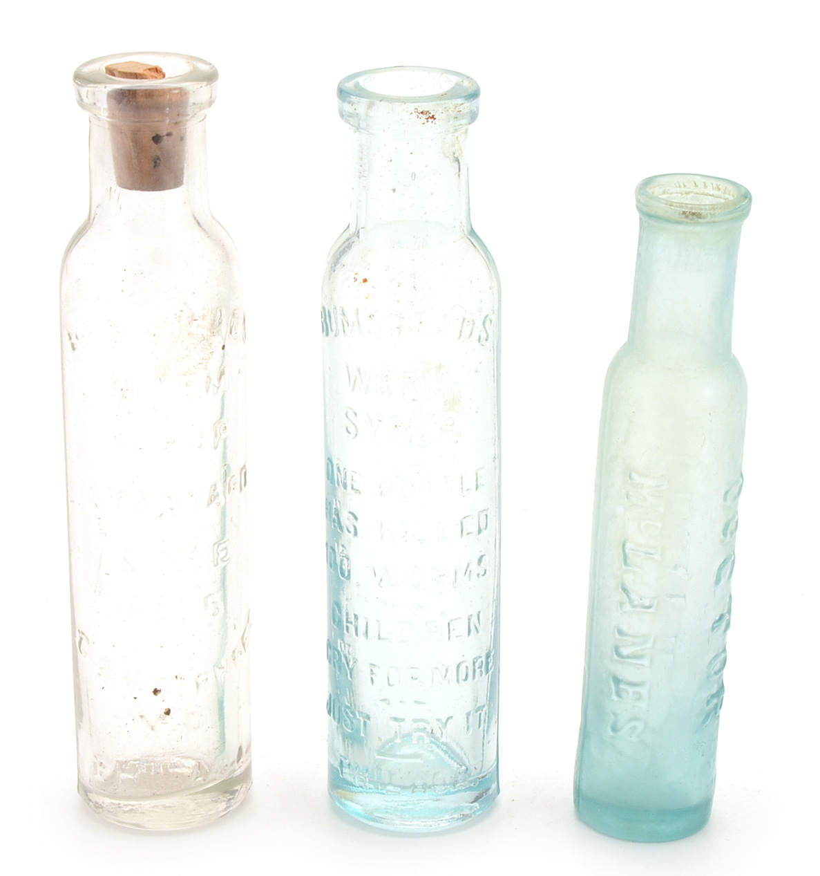 Sixteen Vintage Worm Remedy Bottles