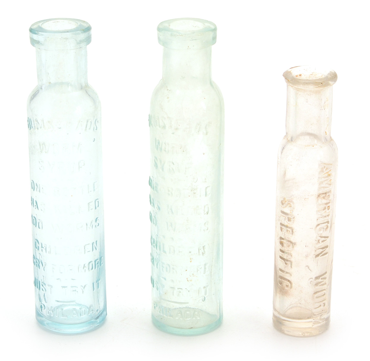 Sixteen Vintage Worm Remedy Bottles