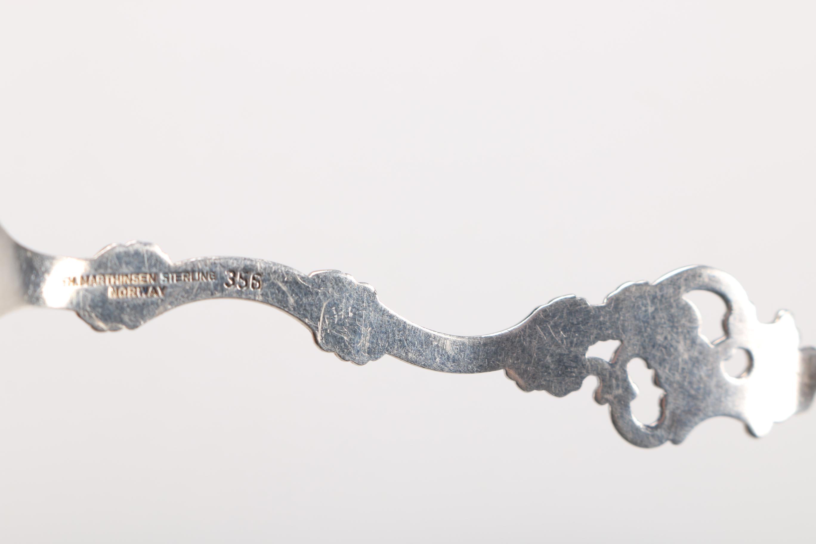 Stieff "Williamsburg Restoration" Pewter Spoon and Th Marthinsen Sterling Spoon