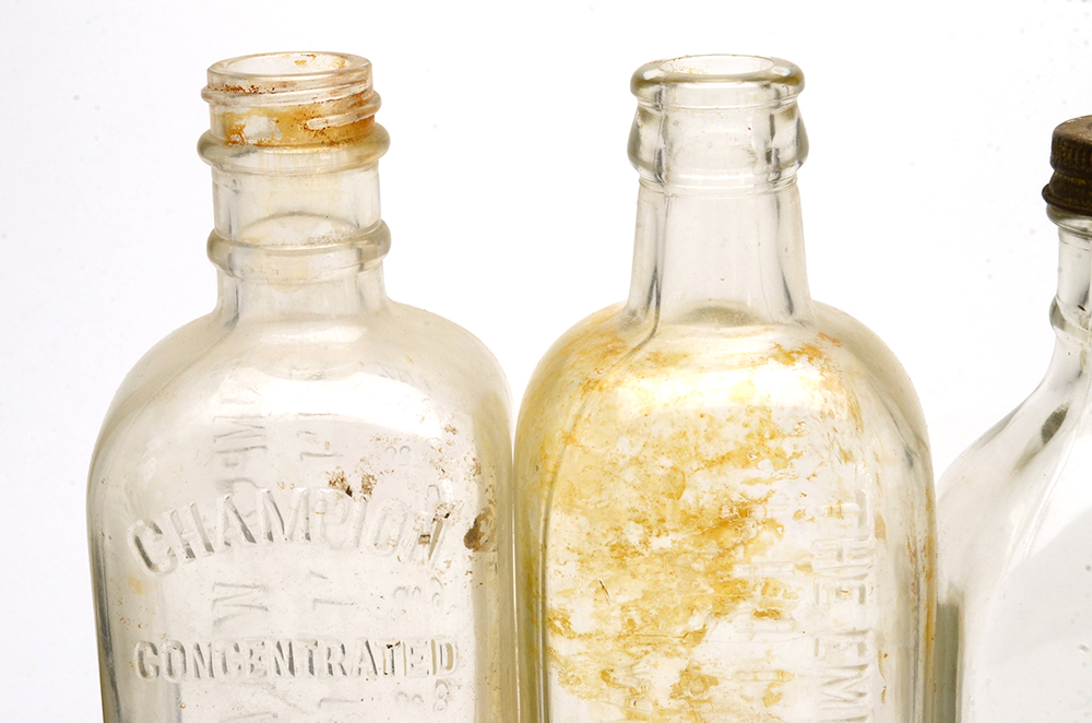 Four Vintage Embalming Fluid Bottles