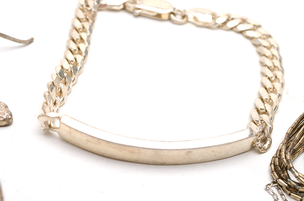 Group of Sterling Earrings, Rings, Pendants and Chains